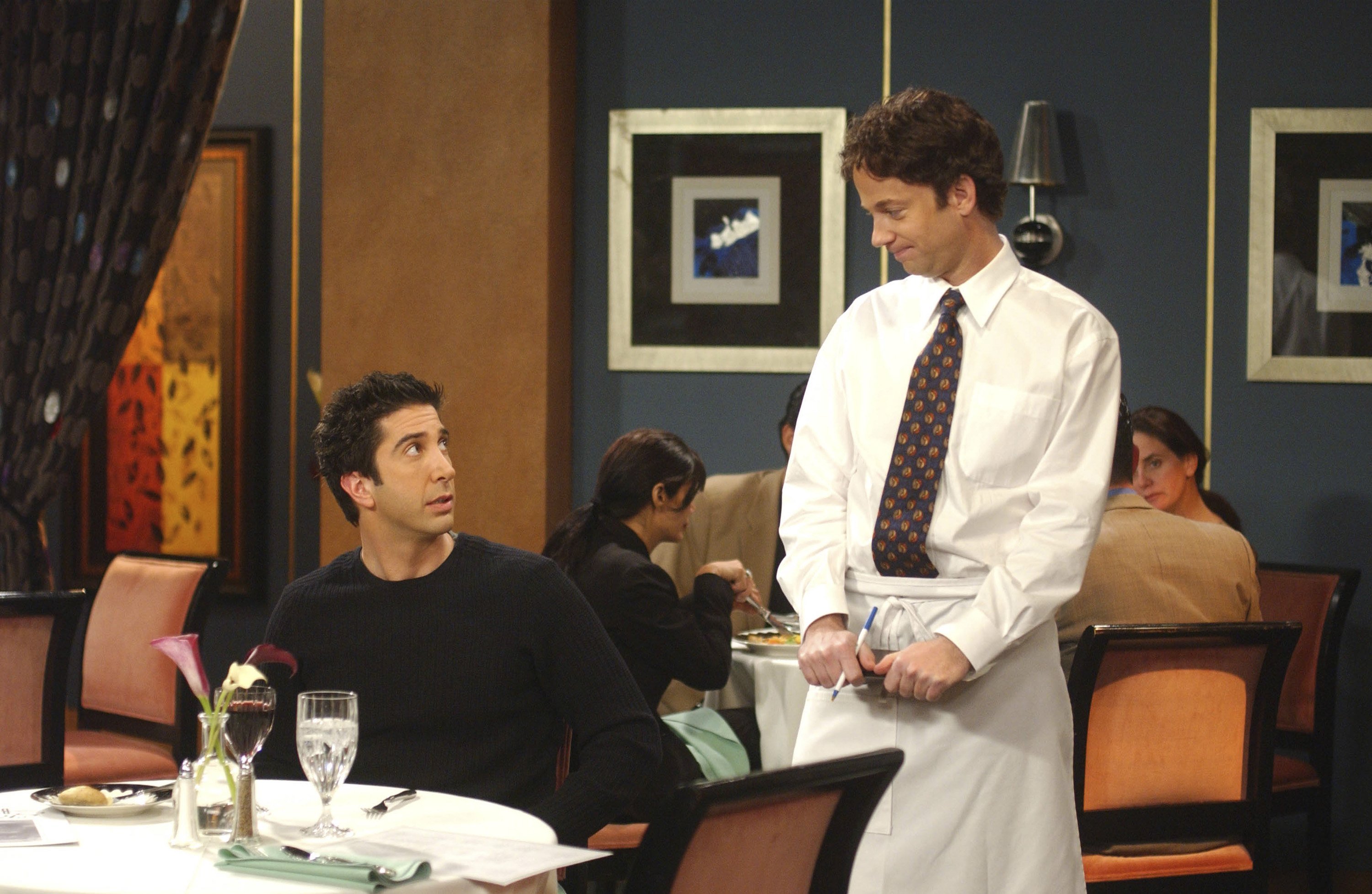 David Schwimmer as Ross Geller, Sam Pancake as The Waiter in an episode of 'Friends'