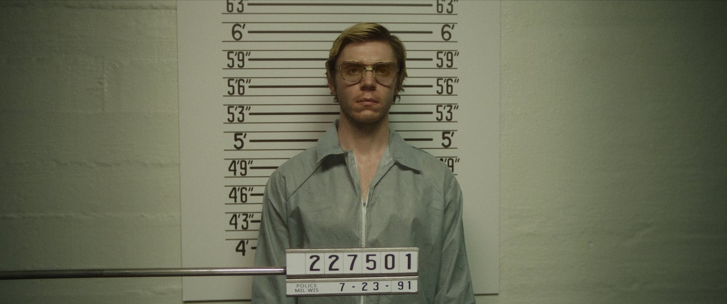 A Tiktokker claims 'Stranger Things' has a scene with Jeffrey Dahmer, seen here as played by Evan Peters, getting a mugshot taken.