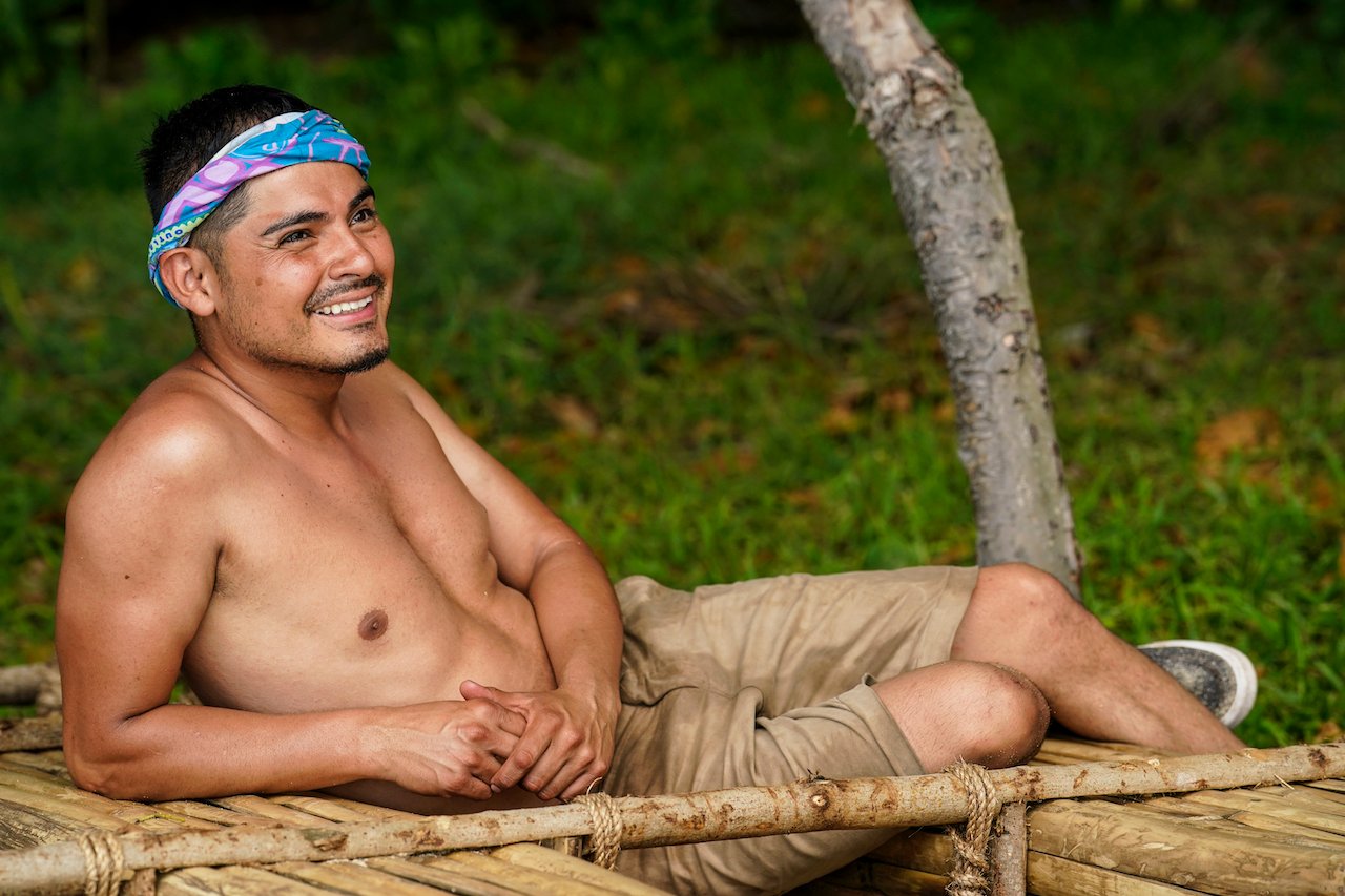 Geo Bustamante lies down on his shelter on 'Survivor 43'.
