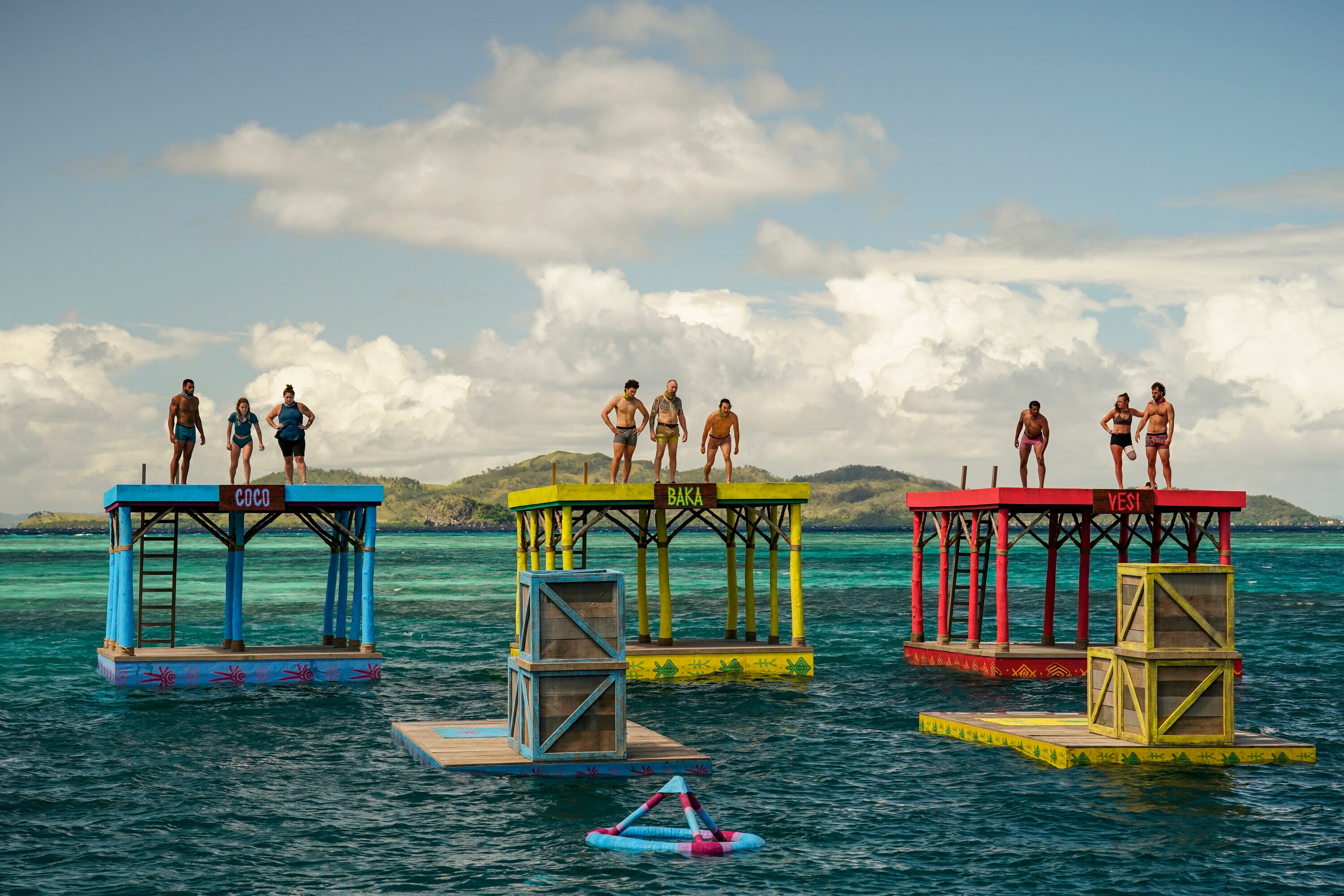 The Coco, Baka, and Vesi tribes compete in the Immunity Challenge in 'Survivor' Season 43 Episode 3 tonight, Oct. 5, on CBS. Three members from each tribe stand on three different platforms in the water.