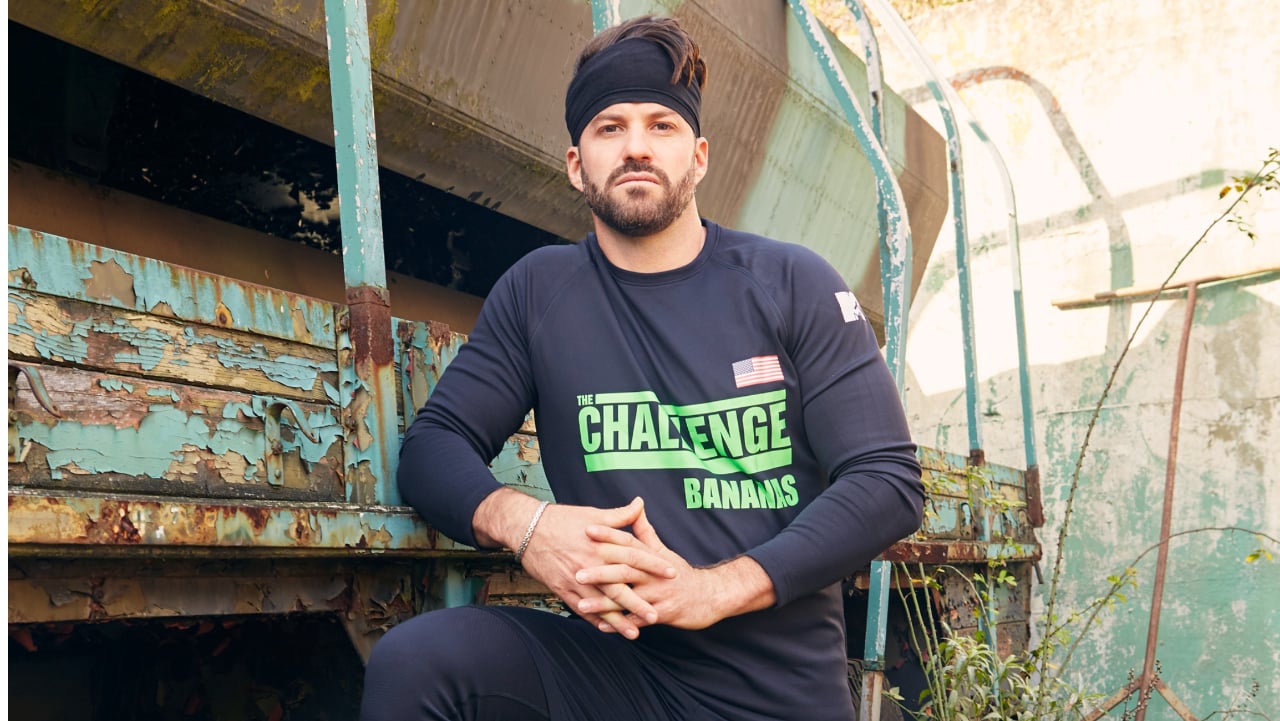 Johnny 'Bananas' Devenanzio posing for 'The Challenge: Total Madness' cast photo