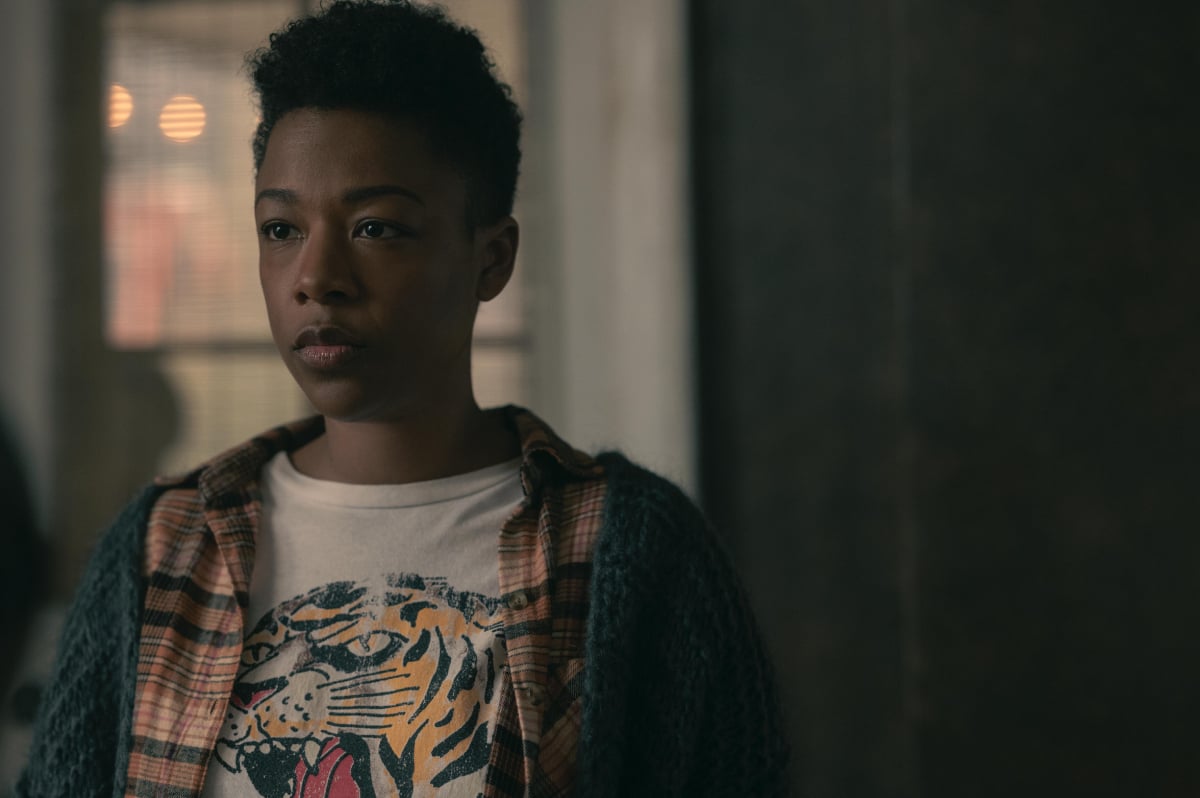 In The Handmaid's Tale Season 5, Moira wears a tiger t-shirt and a jacket.