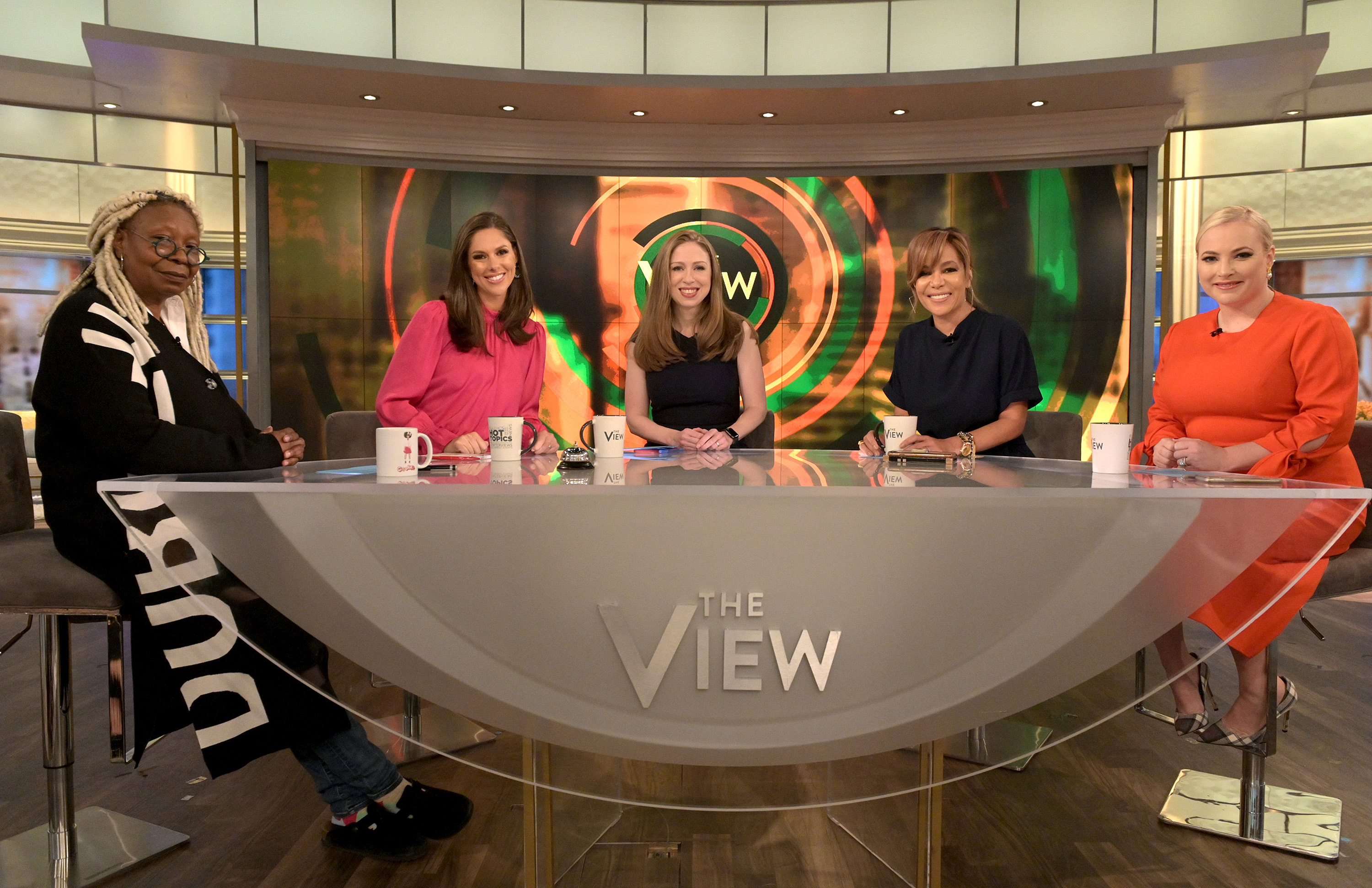 'The View' co-hosts Whoopi Goldberg, Abby Huntsman, Chelsea Clinton, Sunny Hostin, and Meghan McCain pose for a photo before a taping.