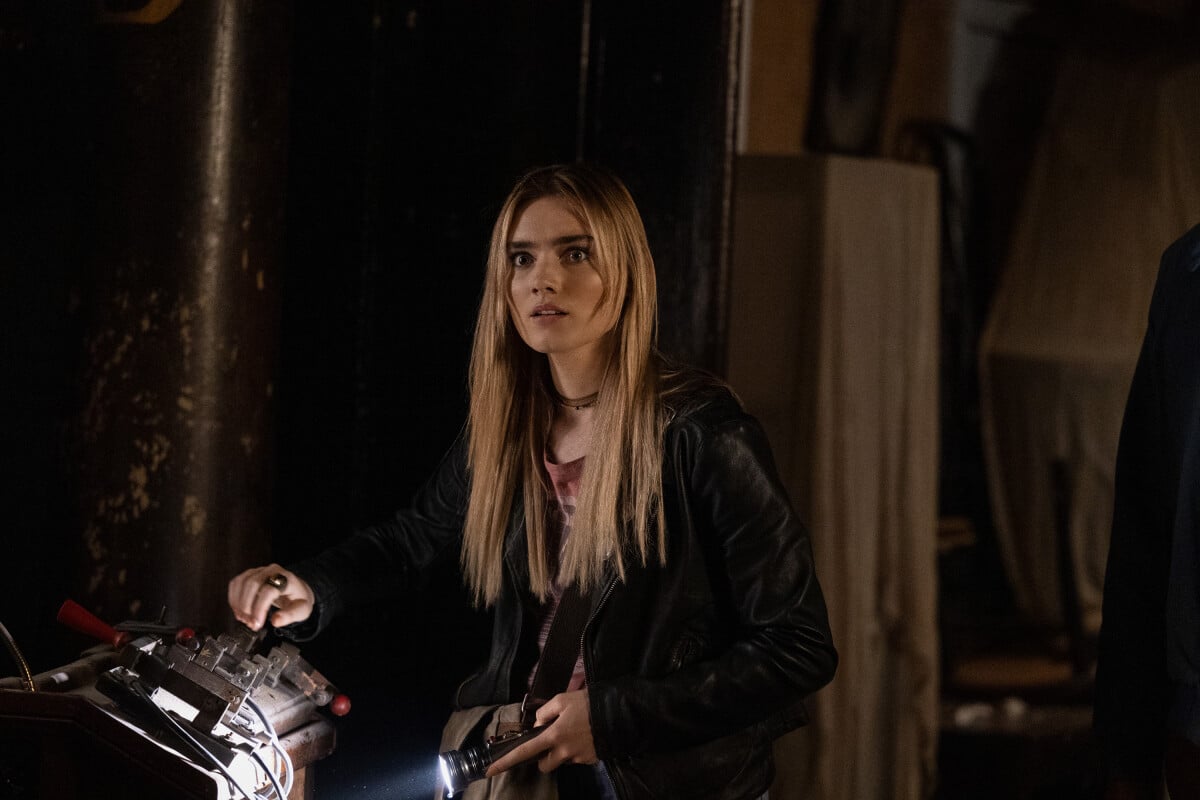 'The Winchesters': Mary (Meg Donnelly) holds a flashlight and pulls a lever