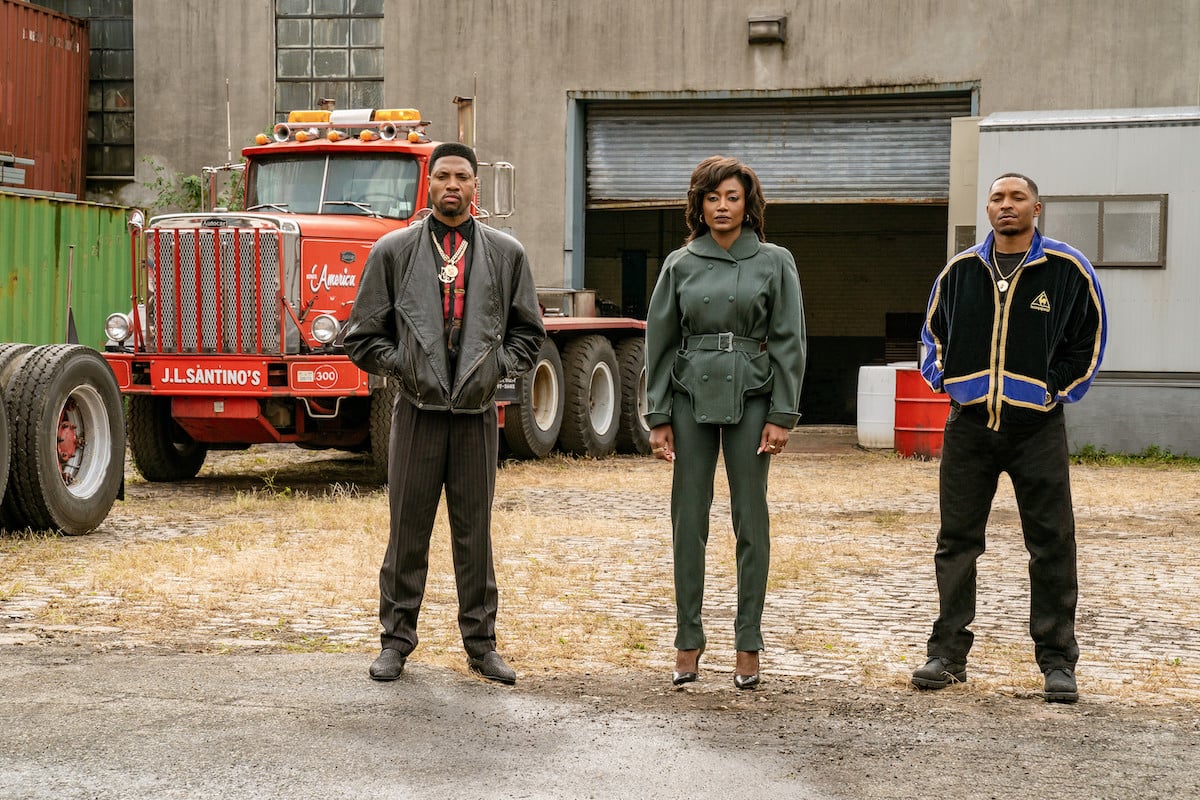 London Brown as Marvin Thomas, Patina Miller as Raq Thomas and Malcolm Mays as Lou Thomas standing in a truck yard in 'Power Book III: Raising Kanan