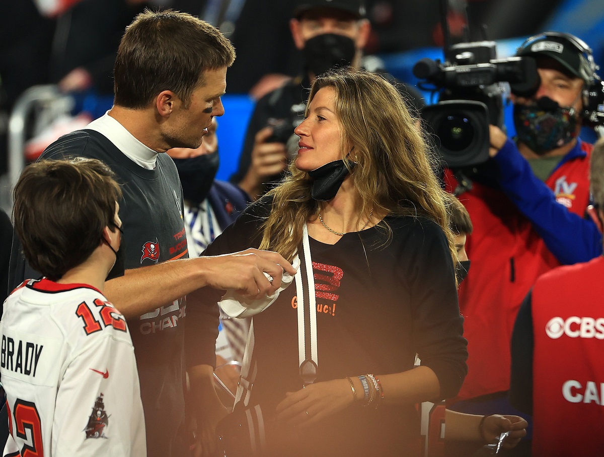 Tom Brady talking with Gisele Bundchen after his Tampa Bay Buccaneers won Super Bowl LV