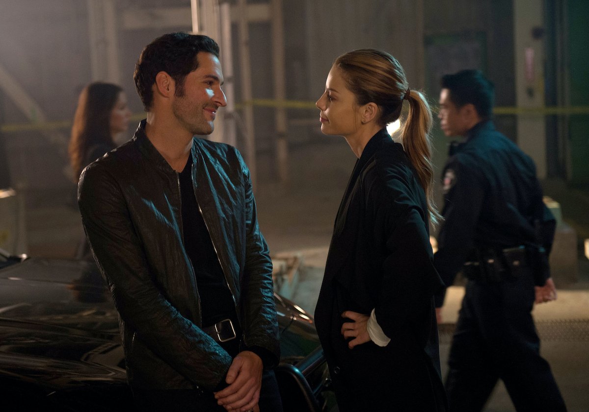 Tom Ellis and Lauren German smiling