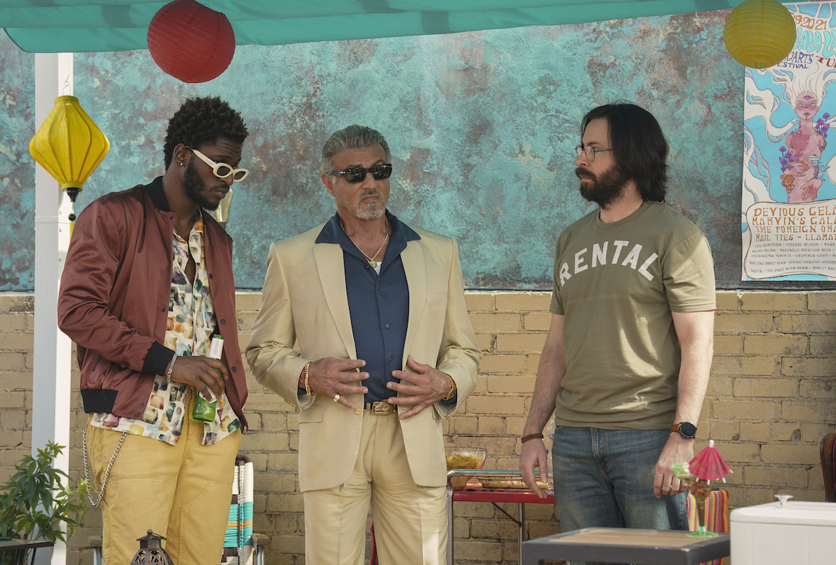 'Tulsa King': Sylvester Stallone, Jay Will and Martin Starr stand in front of a wall