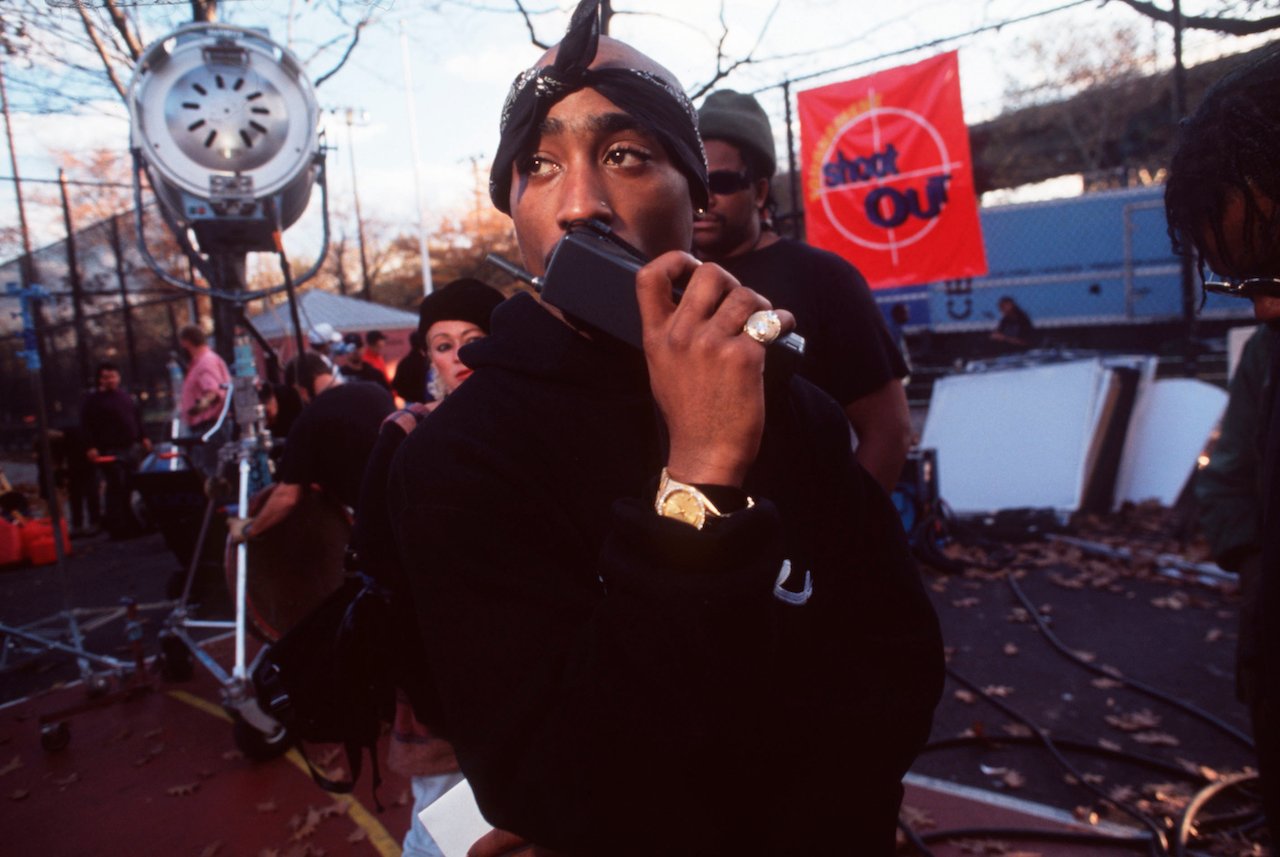 Tupac Skur on set on phone; Shakur improvised a line from 'Juice'