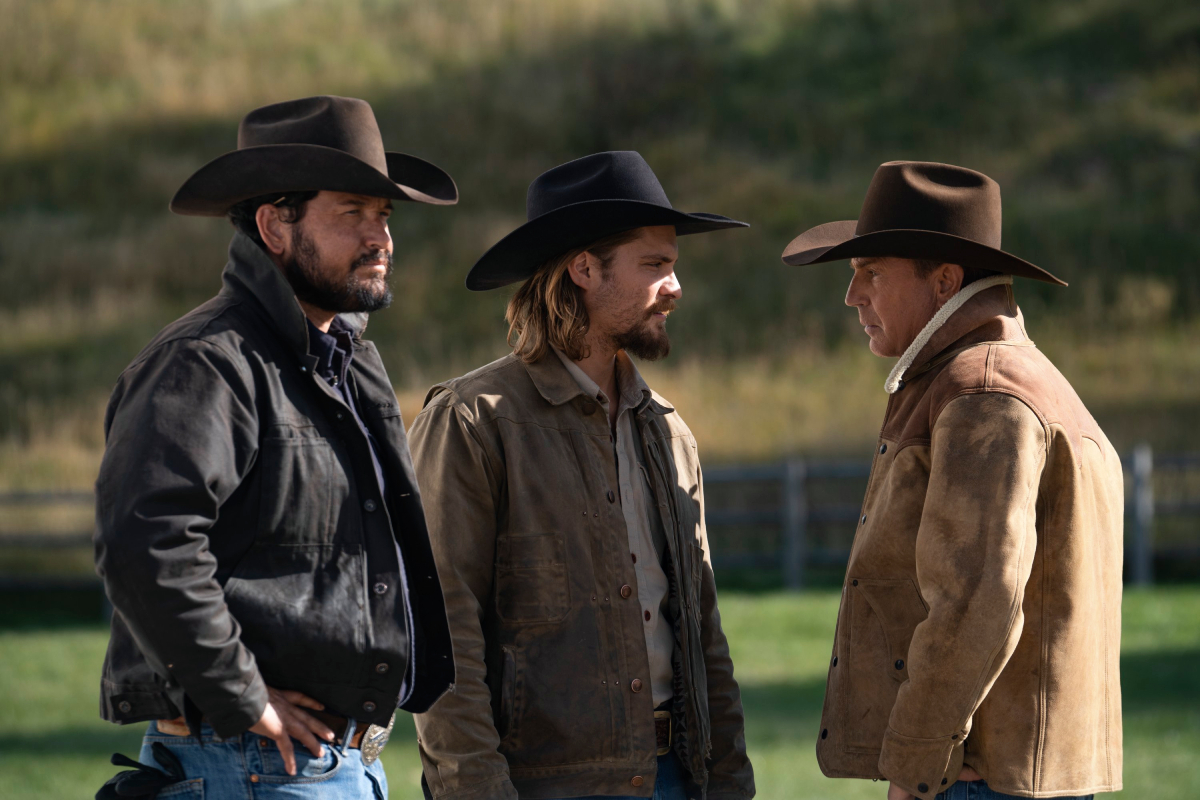 Yellowstone season 5 stars Cole Hauser, Luke Grimes, and Kevin Costner in an image from season 3