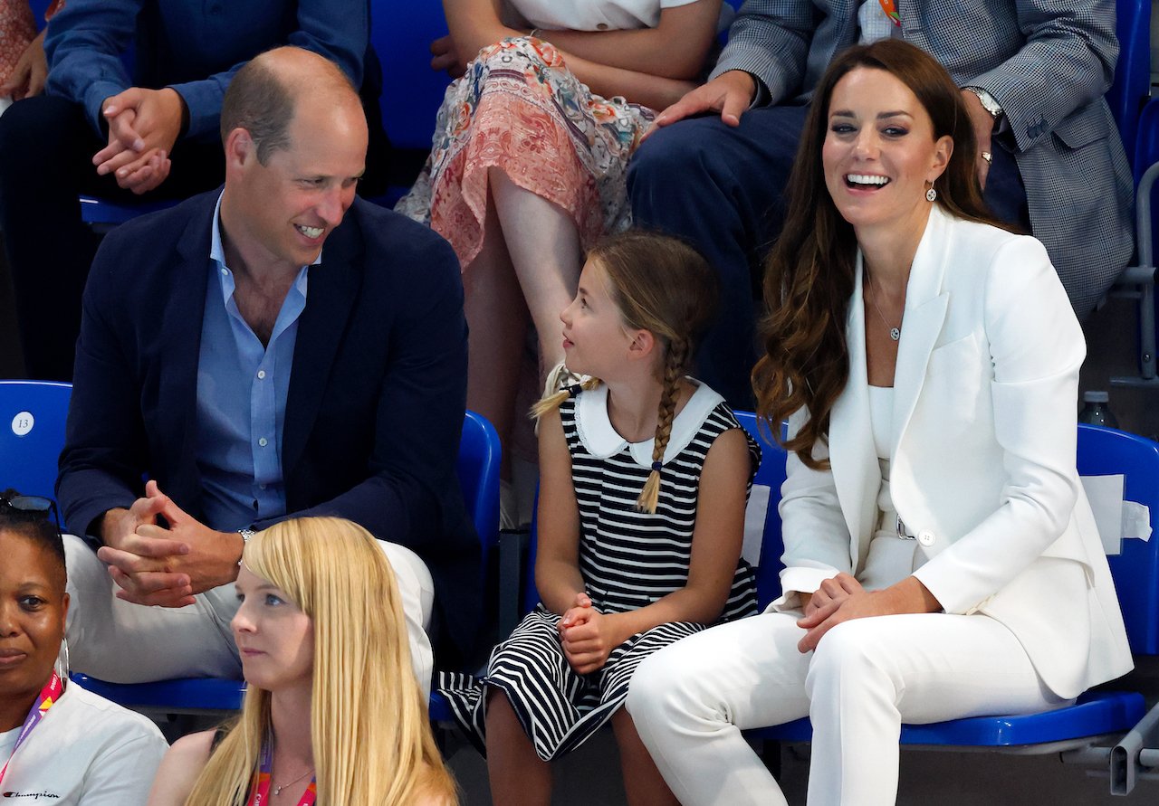 Prince William, Princess Charlotte, and Kate Middleton, Princess of Wales, watch the swimming competition at the Sandwell Aquatics Centre during the 2022 Commonwealth Games on August 2, 2022 in Birmingham, England.