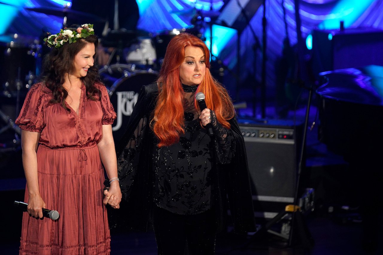 Ashley and Wynonna Judd, pictured at Naomi Judd's memorial in 2022, are 'closer than ever.'