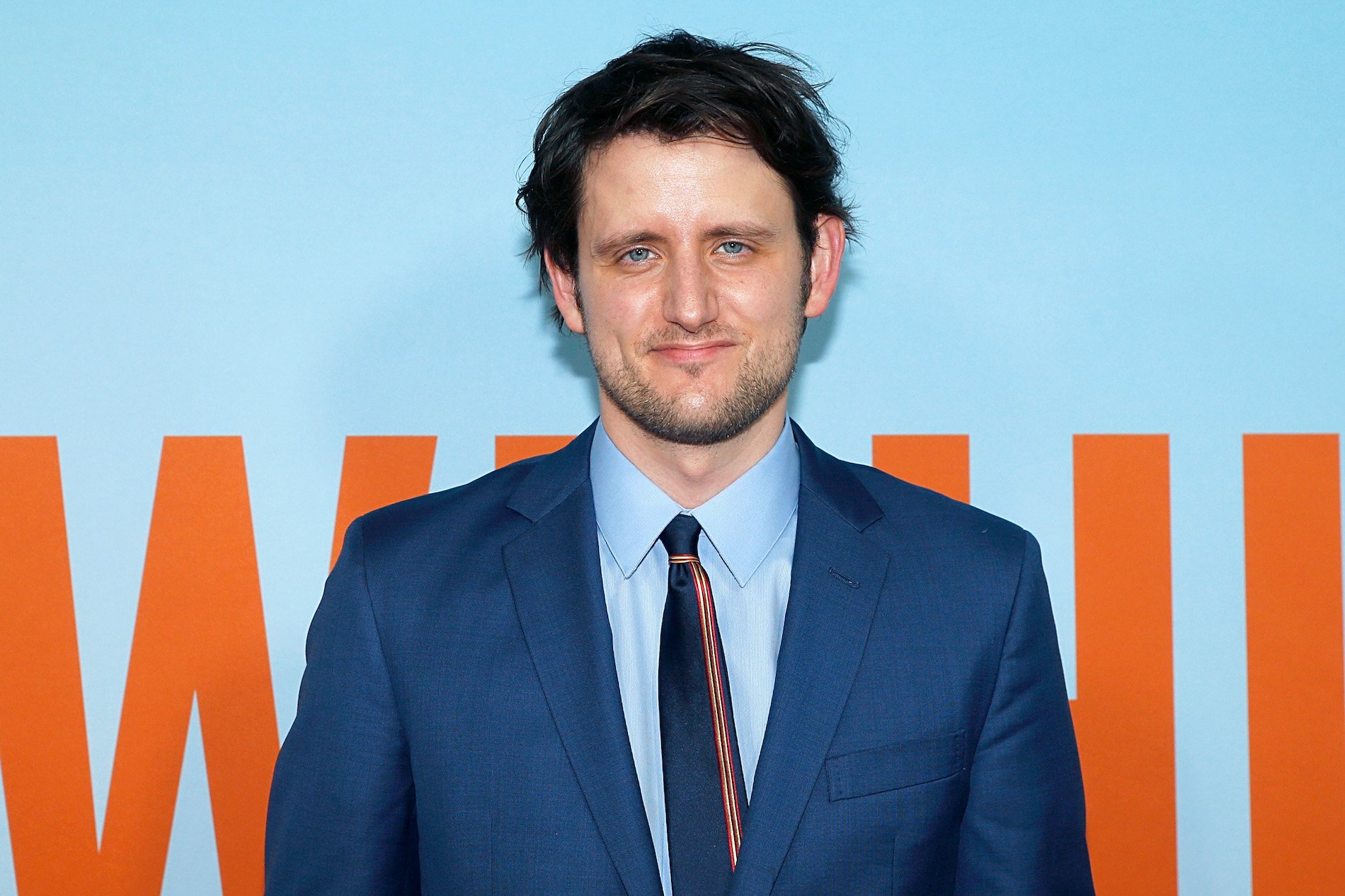 Zach Woods, who had a feud with Drake, posing for a photo.