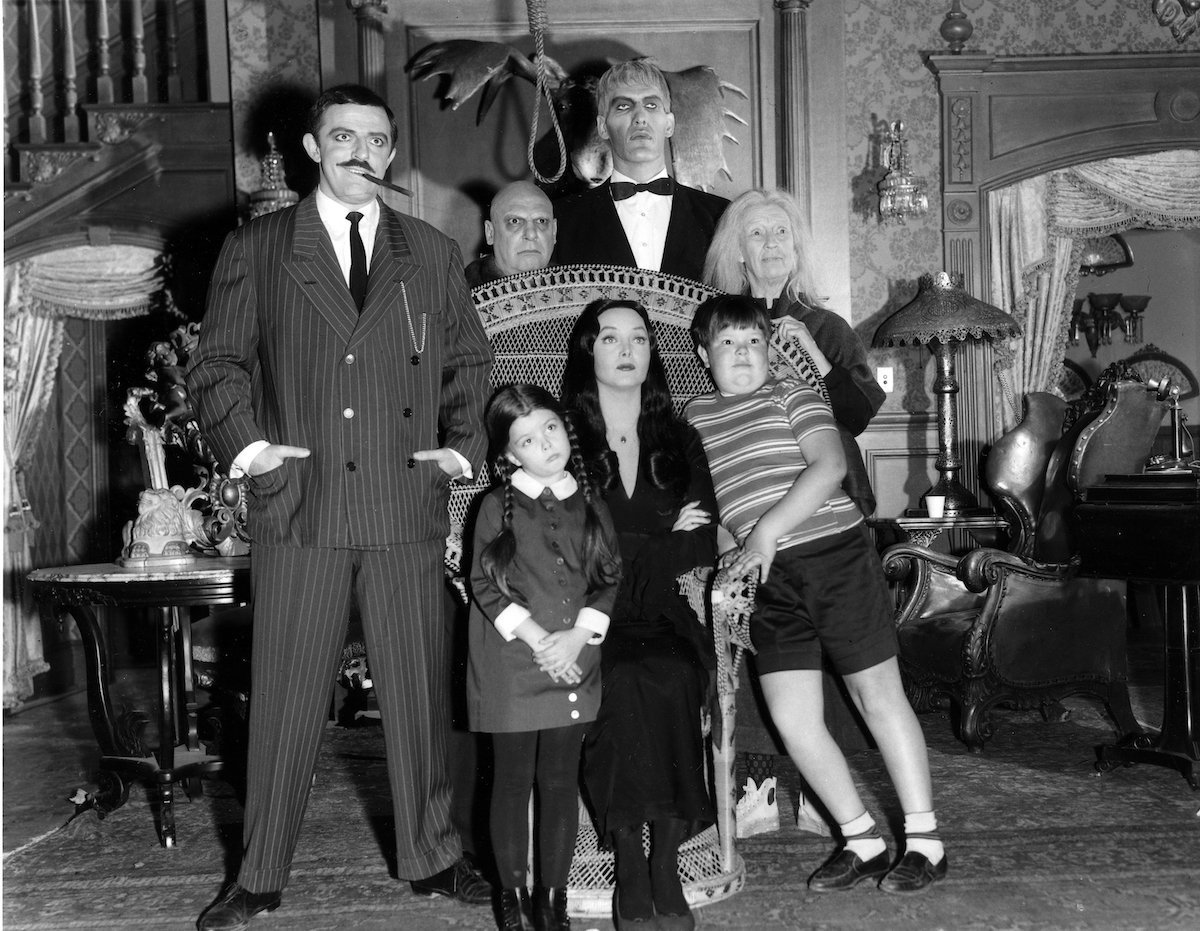 The Addams Family who inspired many TV shows and movies: Gomez Addams (John Astin, left) was madly in love with his wife, Morticia (Carolyn Jones, seated), and their two children, Wednesday (Lisa Loring) and Pugsley (Ken Weatherwax). The family, including Uncle Fester (Jackie Coogan), their towering butler Lurch (Ted Cassidy), Grandmama (Blossom Rock), and Thing, a hand that usually appeared out of a small wooden box, resided in an ornate, gloomy mansion.