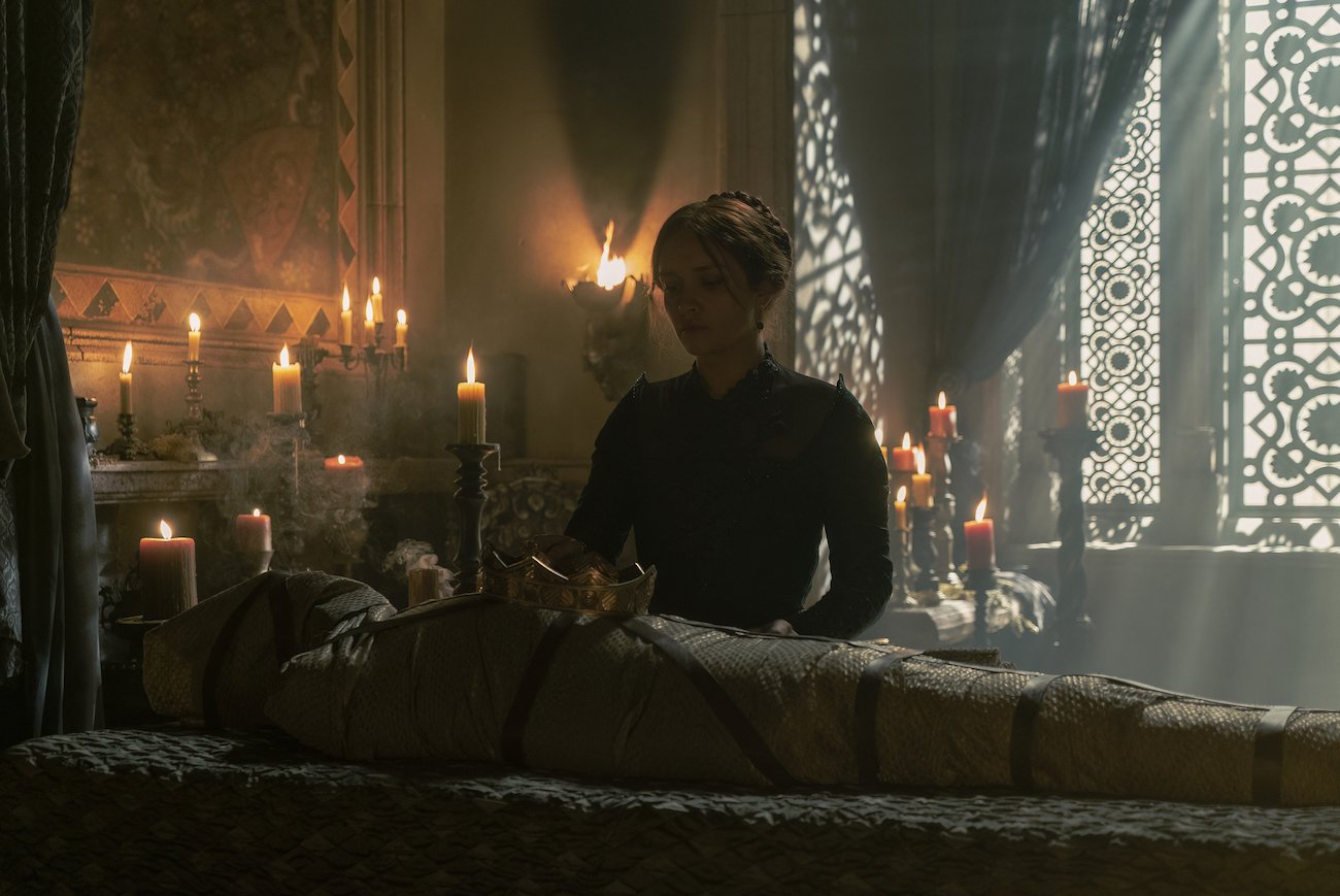 Alicent Hightower (Olivia Cooke) with a dead King Viserys in 'House of the Dragon' Episode 9