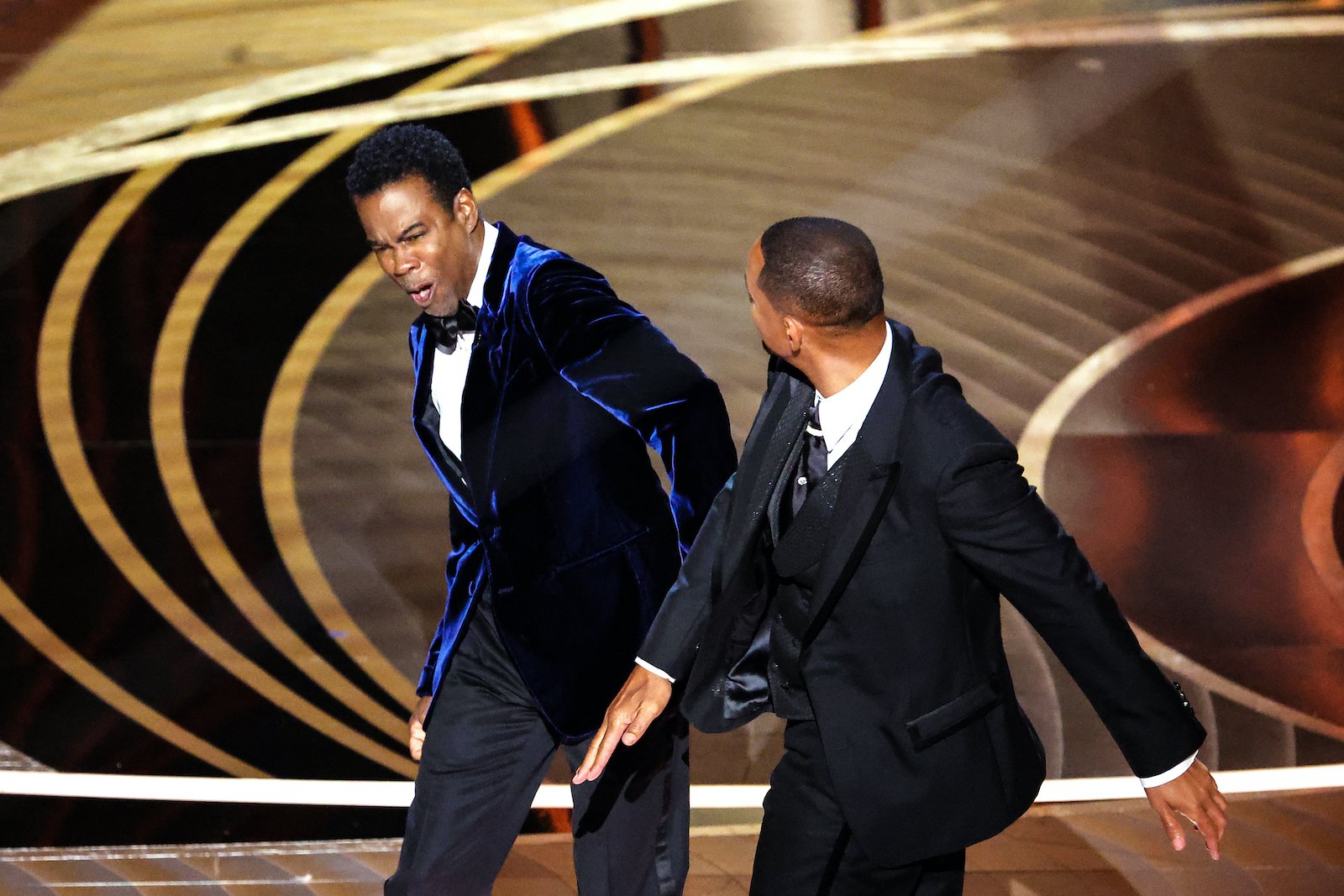 Will Smith slaps Chris Rock during the Academy Awards ceremony in 2022