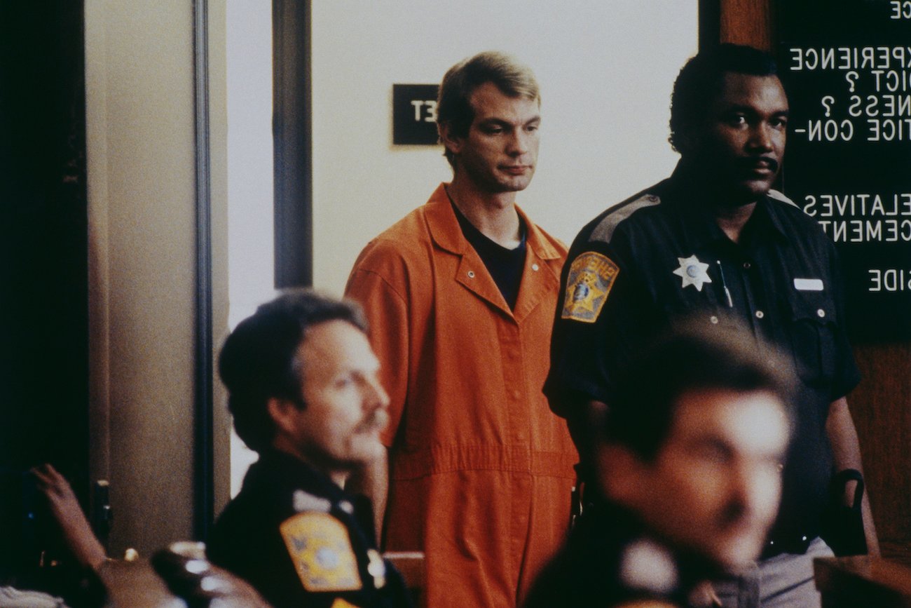 Jeffrey Dahmer enters the court room for his murder trial, which reporter Anne Schwartz wrote a book about