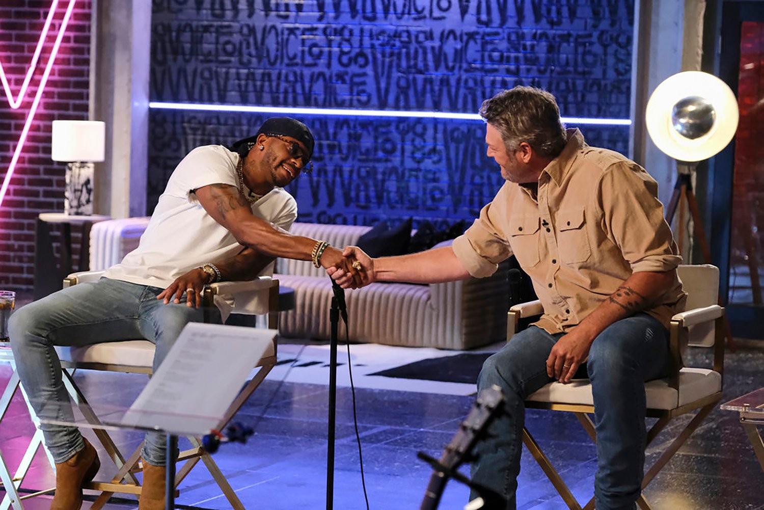 Jimmie Allen shakes hands with Blake Shelton on The Voice Season 22.