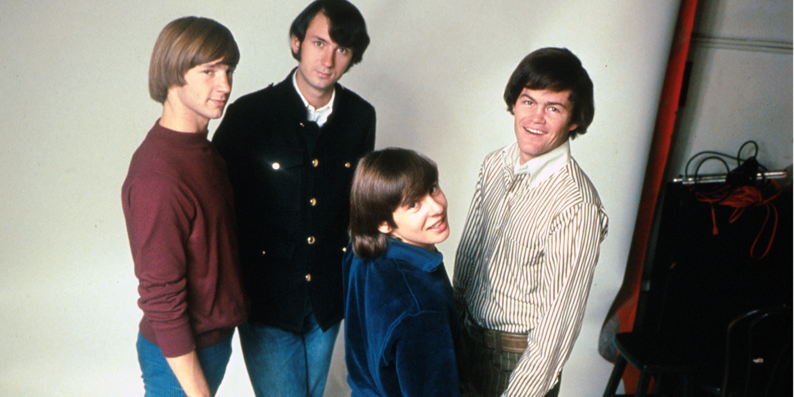 Peter Tork, Mike Nesmith, Davy Jones, and Micky Dolenz pose for the cover of the third Monkees album 'Headquarters.'