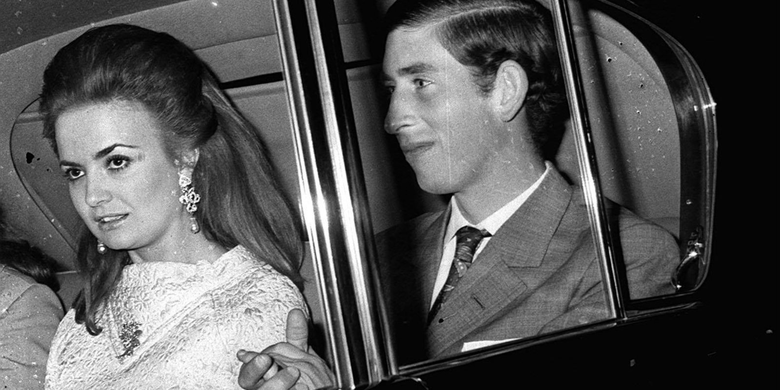 Then-Prince Charles and Lucia Santa Cruz riding in a car together after seeing the play 'The Contractor'.