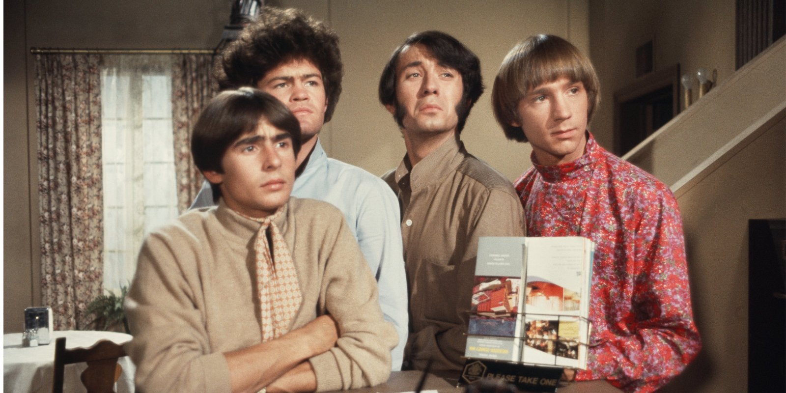 The Monkees on the set of their television show. The cast included Mike Nesmith, Micky Dolenz, Peter Tork, and Davy Jones.