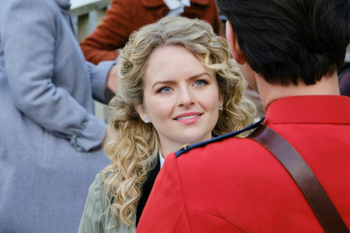 Andrea Brooks as Faith looking at Mountie Nathan in 'When Calls the Heart' Season 9