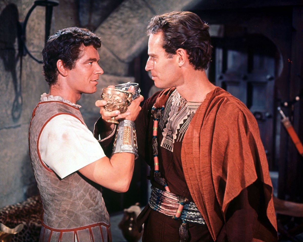 'Ben-Hur': Ben-Hur (Charlton Heston) shares a drink with Messala (Stephen Boyd)