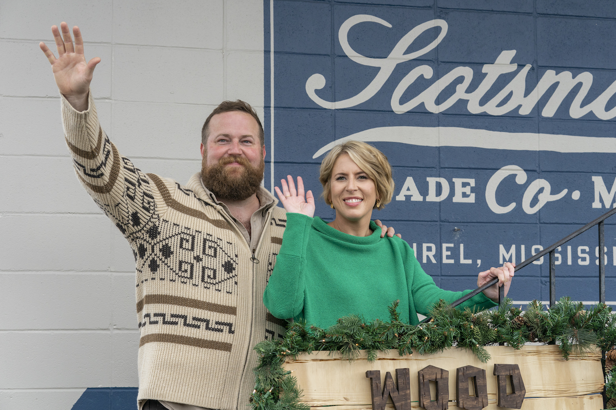 Ben and Erin Napier waving goodbye in the discovery+ Christmas movie 'A Christmas Open House'