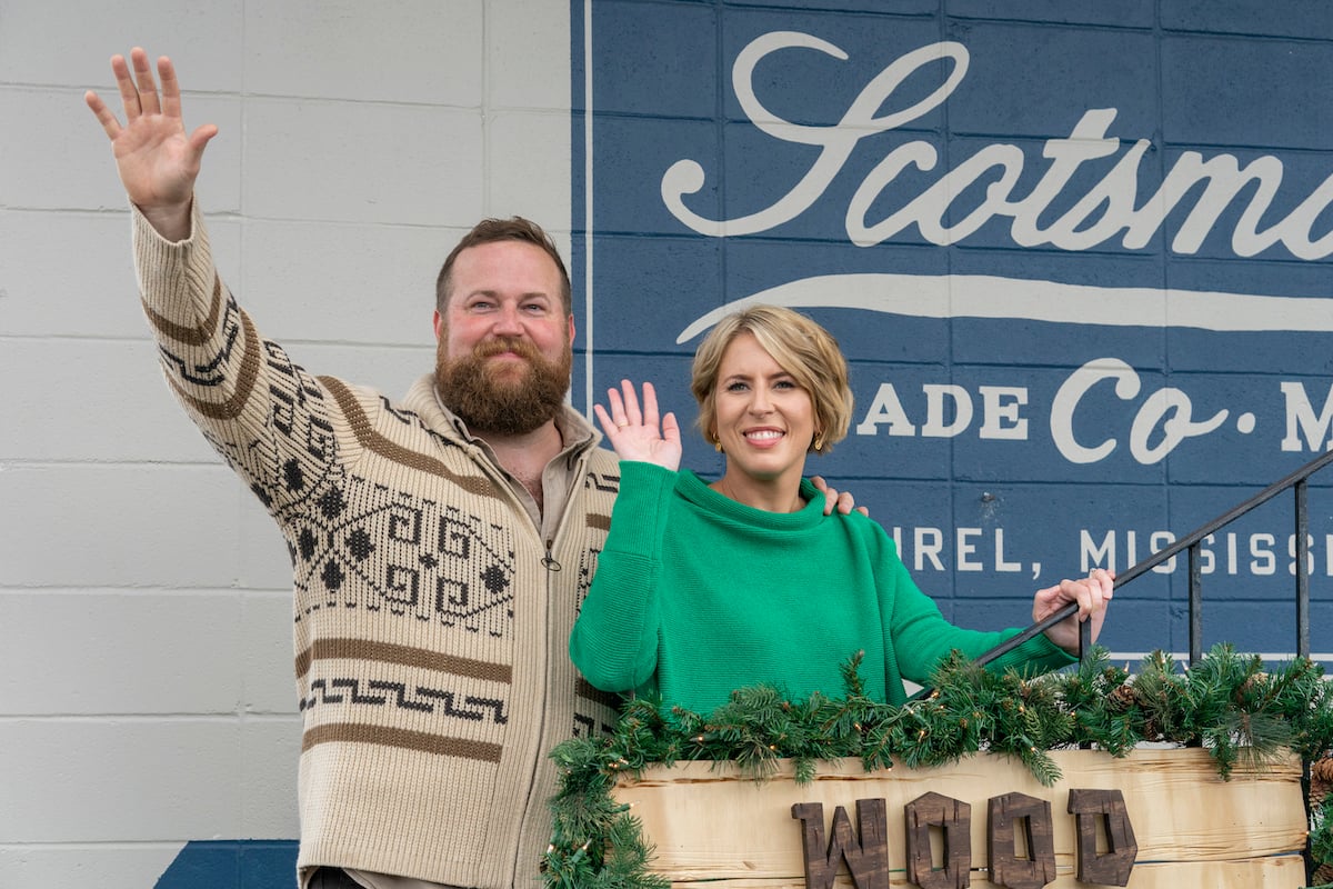 Ben and Erin Napier waving goodbye in the discovery+ Christmas movie 'A Christmas Open House'