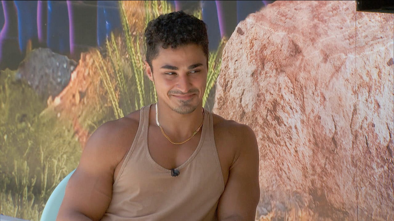 Joseph Abdin sits outside smiling on 'Big Brother 24'.