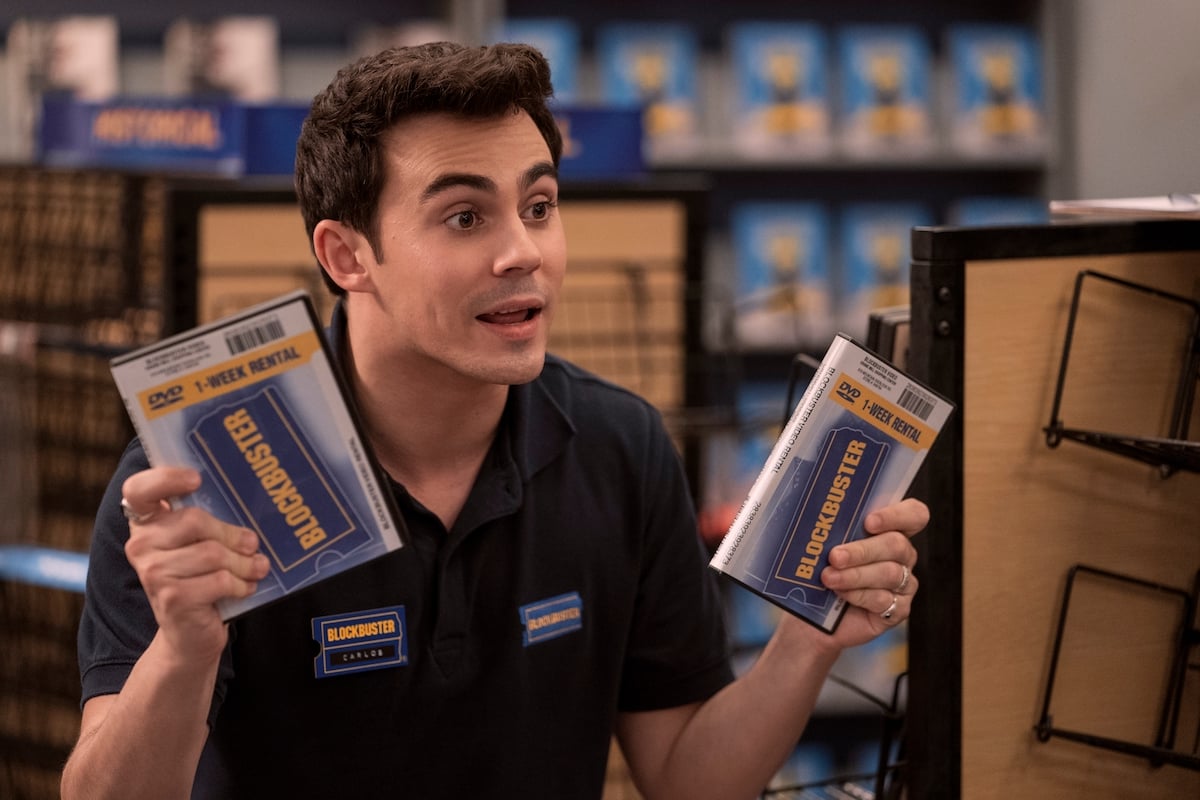 'Blockbuster': Carlos (Tyler Alvarez) holds up two DVDs