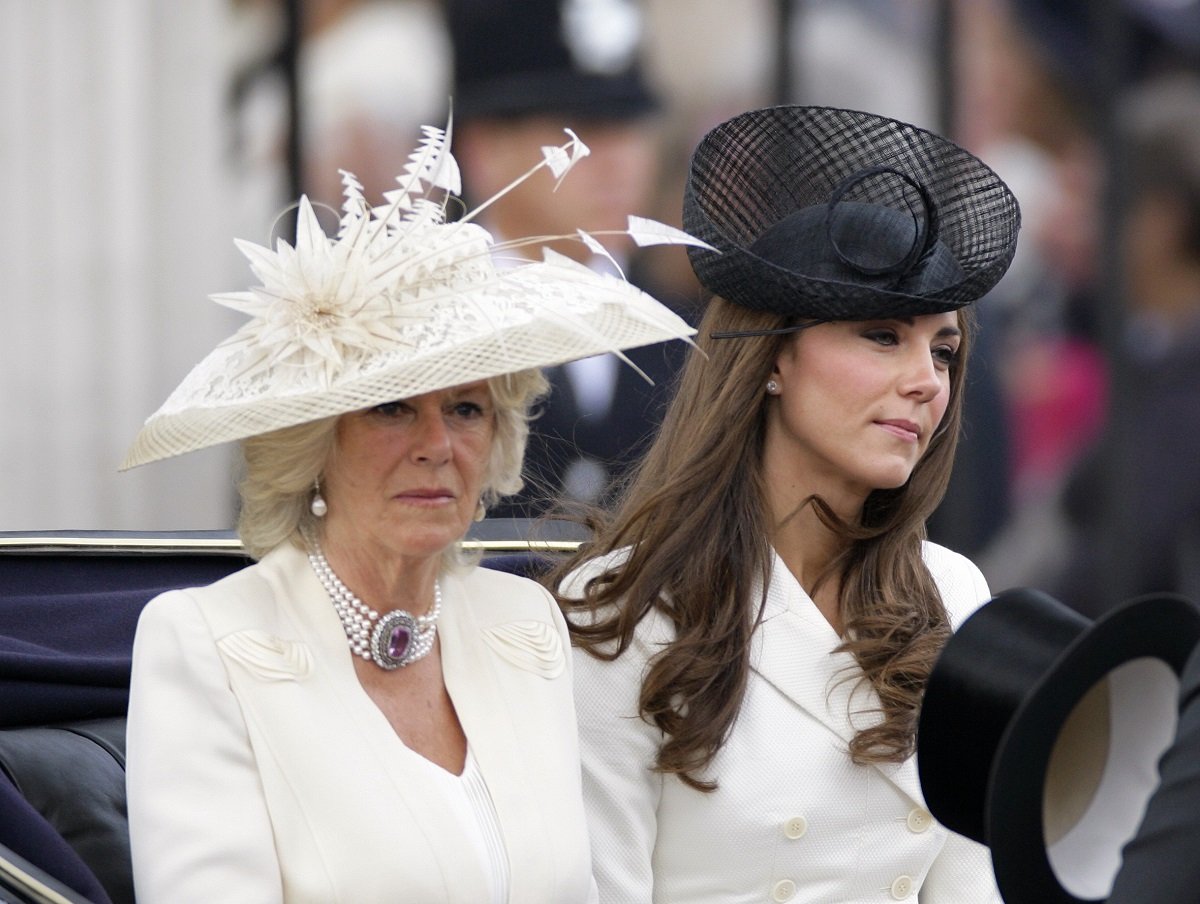 Camilla Parker Bowles, who had a hand in Prince William and Kate Middleton's previous breakup, traveling in a horse-drawn carriage as they attend the Trooping the Colour parade
