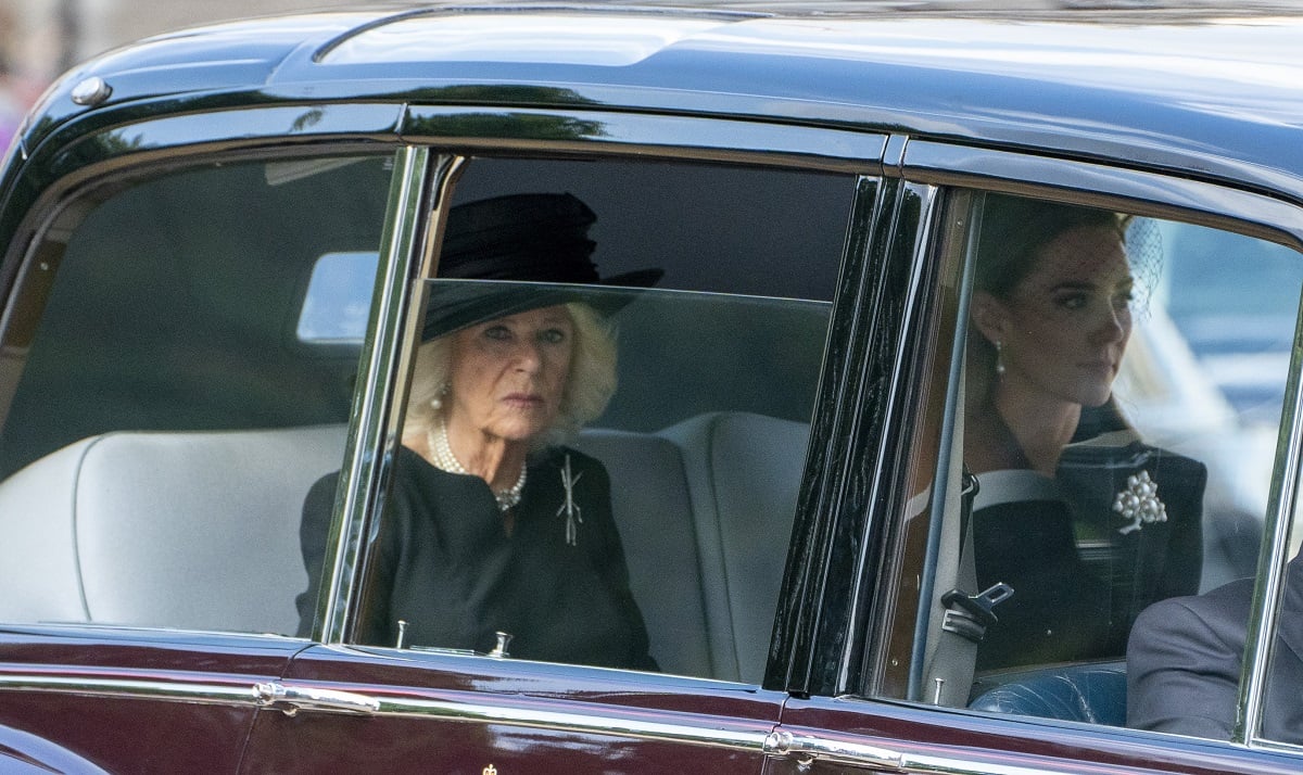 Camilla Parker Bowles and Kate Middleton traveling in a vehicle together during the procession for the lying-in-state of Queen Elizabeth II
