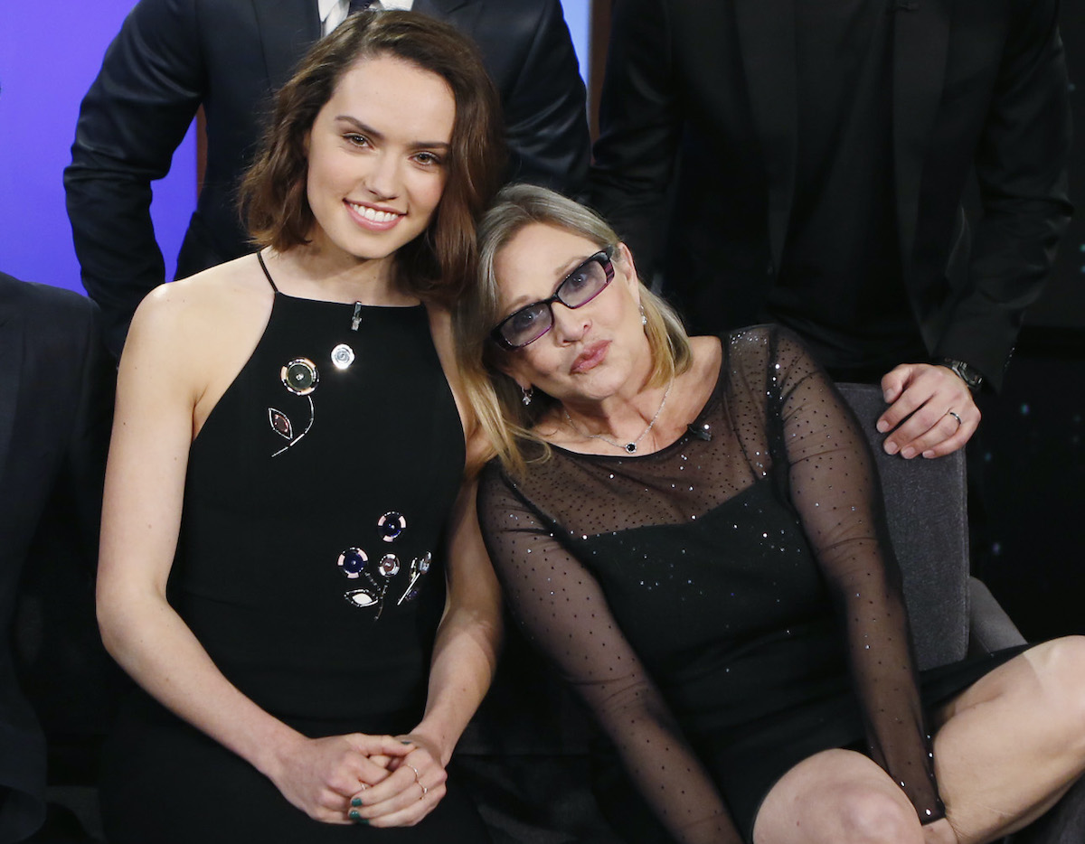 Daisy Ridley and Carrie Fisher smiling