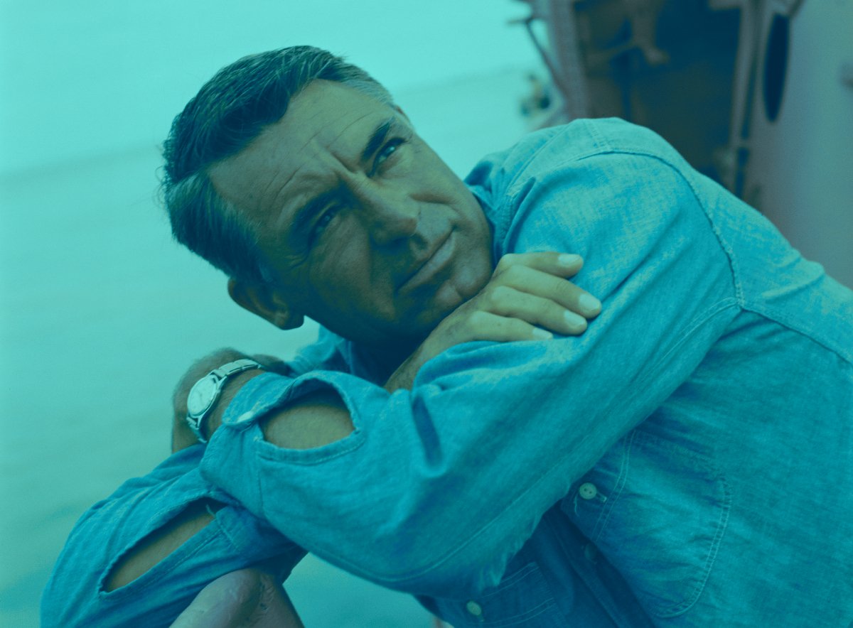 Actor Cary Grant (1904 - 1986) on the deck of a ship, circa 1955