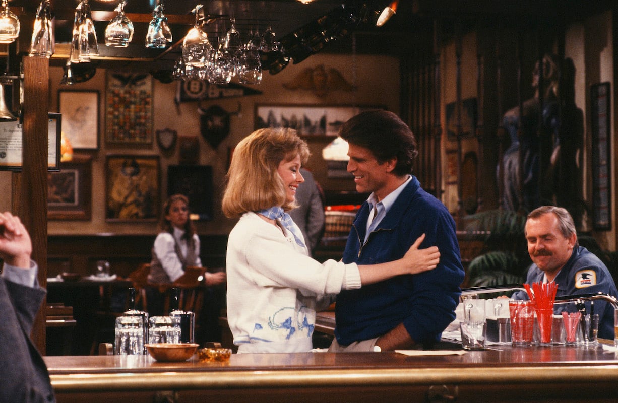 'Cheers': Shelley Long puts her hand on Ted Danson's arm behind the bar