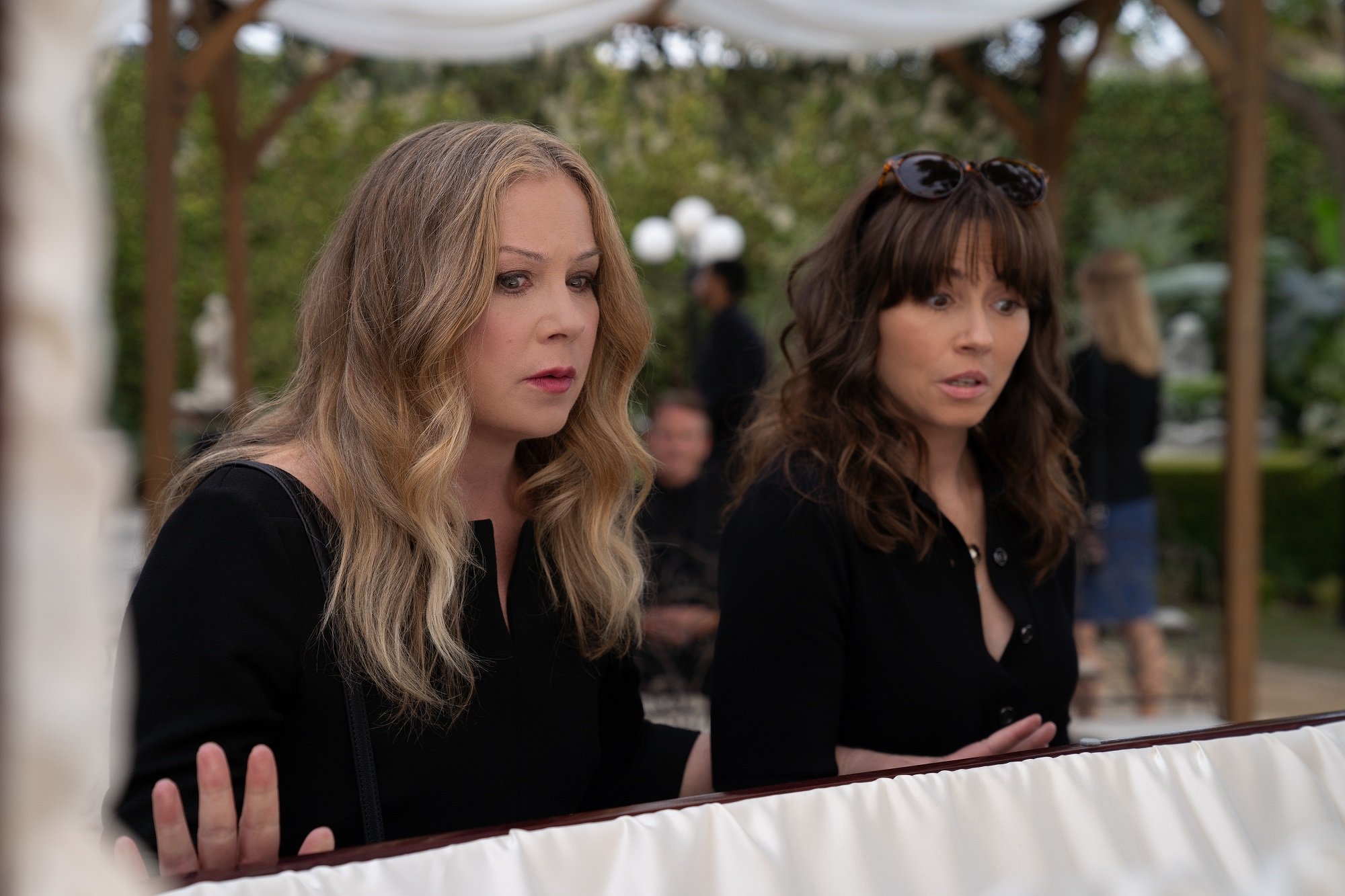 'Dead to Me' Season 3: Christina Applegate as Jen Harding and Linda Cardellini as Judy Hale looking in shock at something