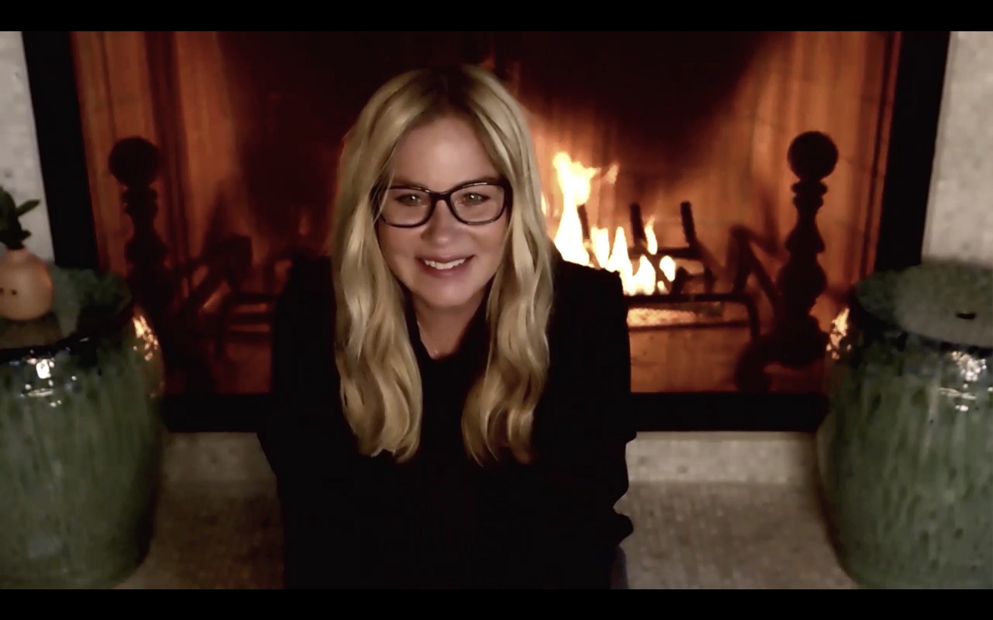 Christina Applegate at the 72nd Emmy Awards via video in front of a fire place