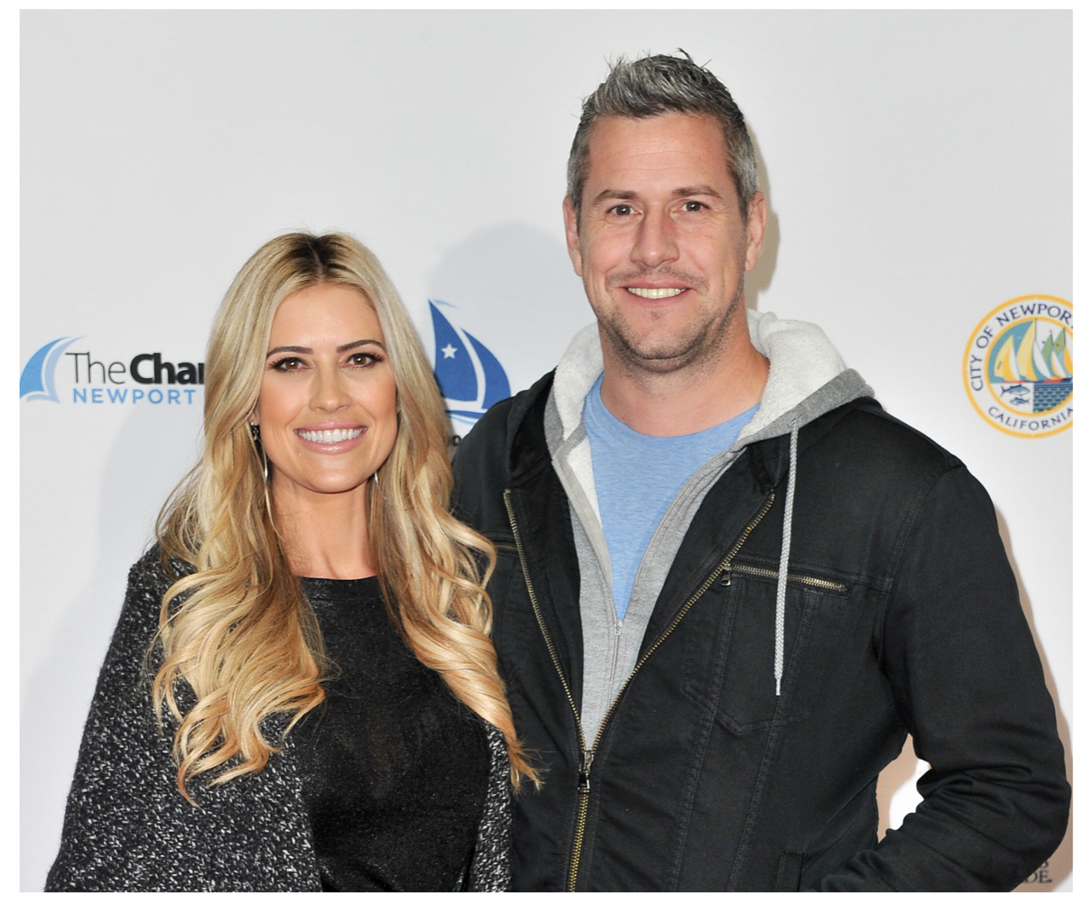 Christina Hall and Ant Anstead, who battled over legal custody of the son, smile and pose together at an event.