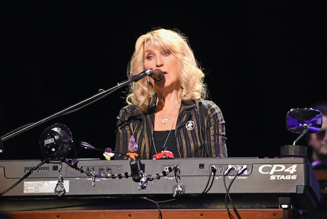 Fleetwood Mac's Christine McVie, who had a nine-figure net worth when she died, performs with the band in 2019.