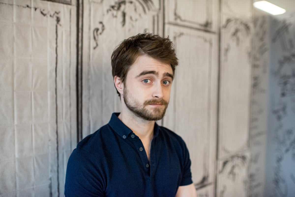 Daniel Radcliffe in front of a white textured background