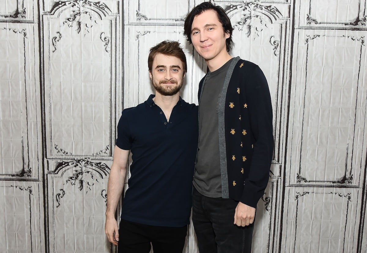 Daniel Radcliffe and Paul Dano smiling