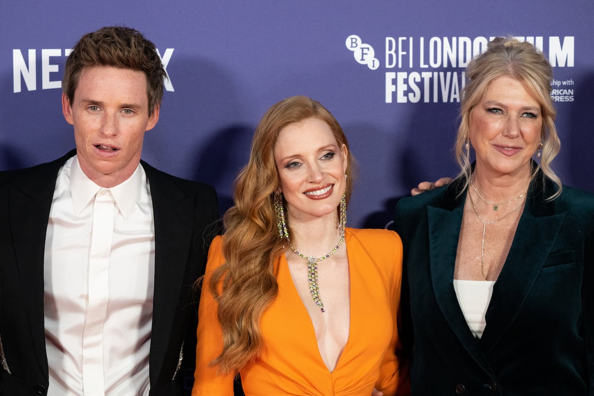 Eddie Redmayne, Jessica Chastain, and Amy Loughren of 'The Good Nurse' smile at the premiere