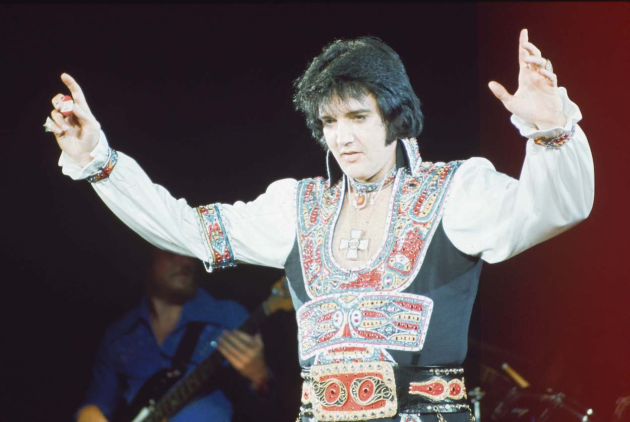 Elvis Presley performs at the Nassau Coliseum in New York on July 20, 1975, the same time period in which he performed a nightly ritual using six words.