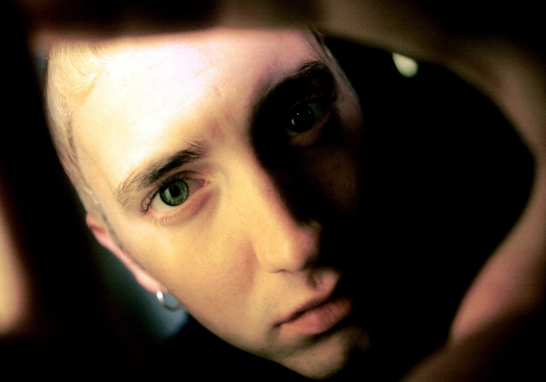 Close-up photo of Eminem, who released his debut album 'Infinite' in 1996