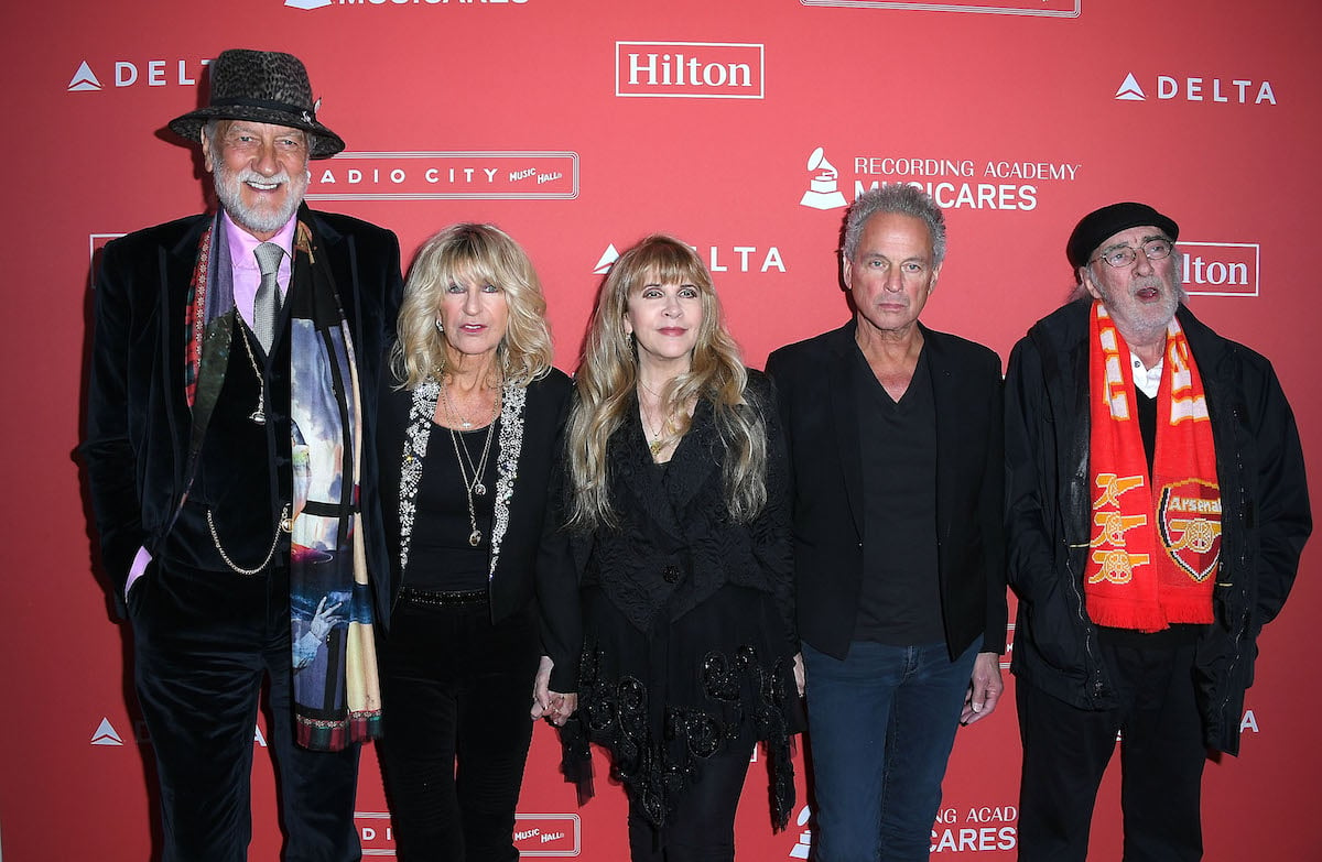 Fleetwood Mac, who once toured Europe on Adolf Hitler's old train, poses together at an event.