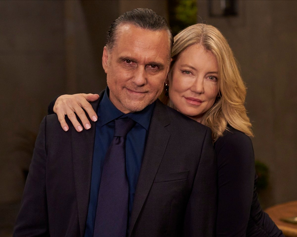 'General Hospital' stars Maurice Benard and Cynthia Watros dressed in black; pose for a photo on set.