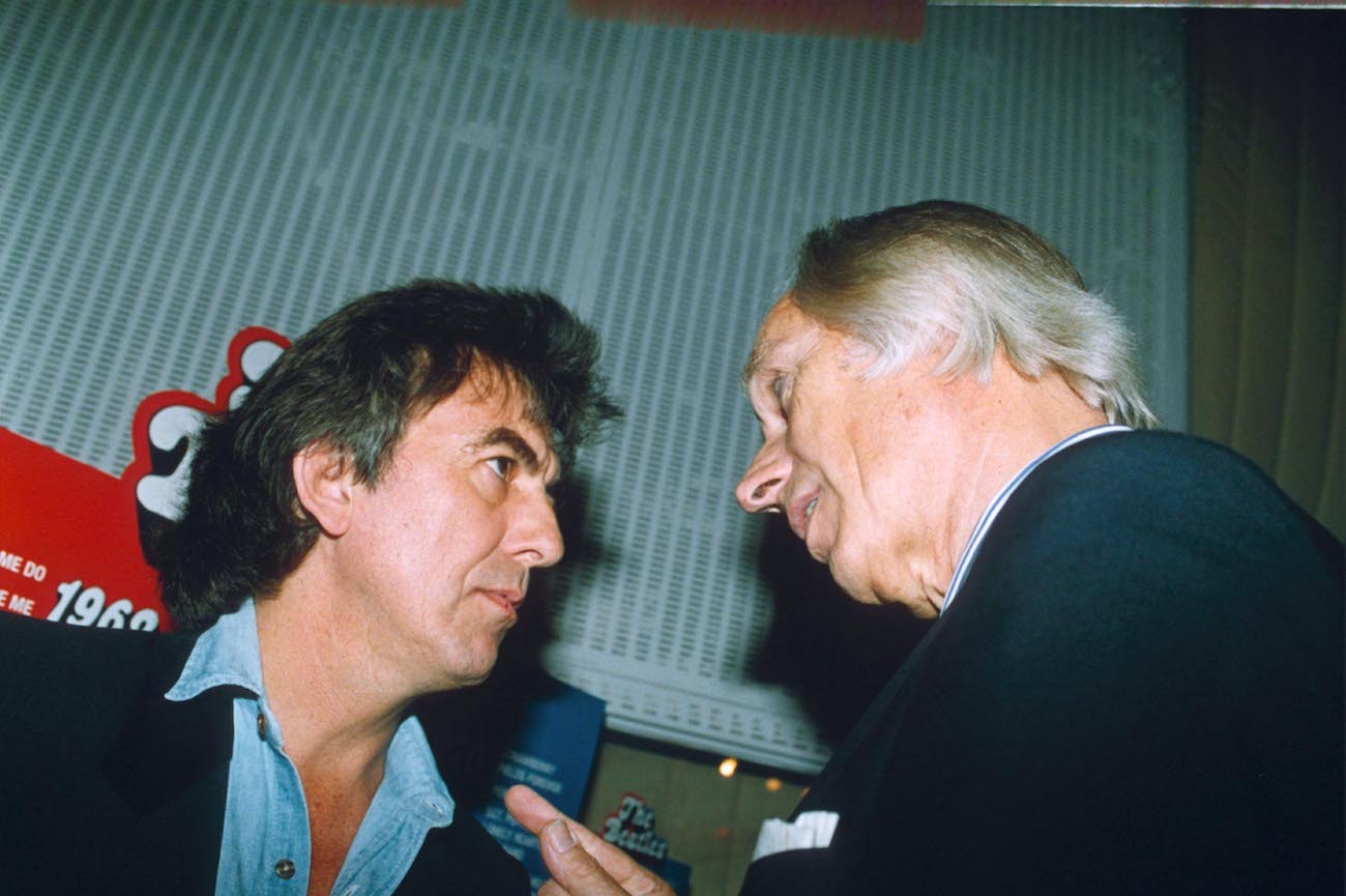 George Harrison and George Martin at an event in 1993.