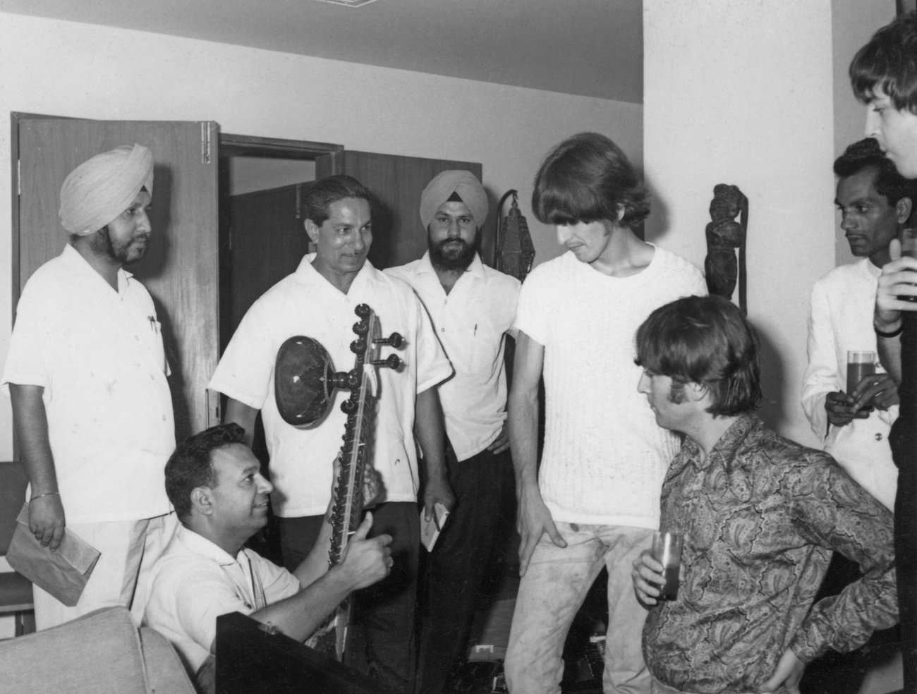 George Harrison and The Beatles learning about Indian music in 1966.