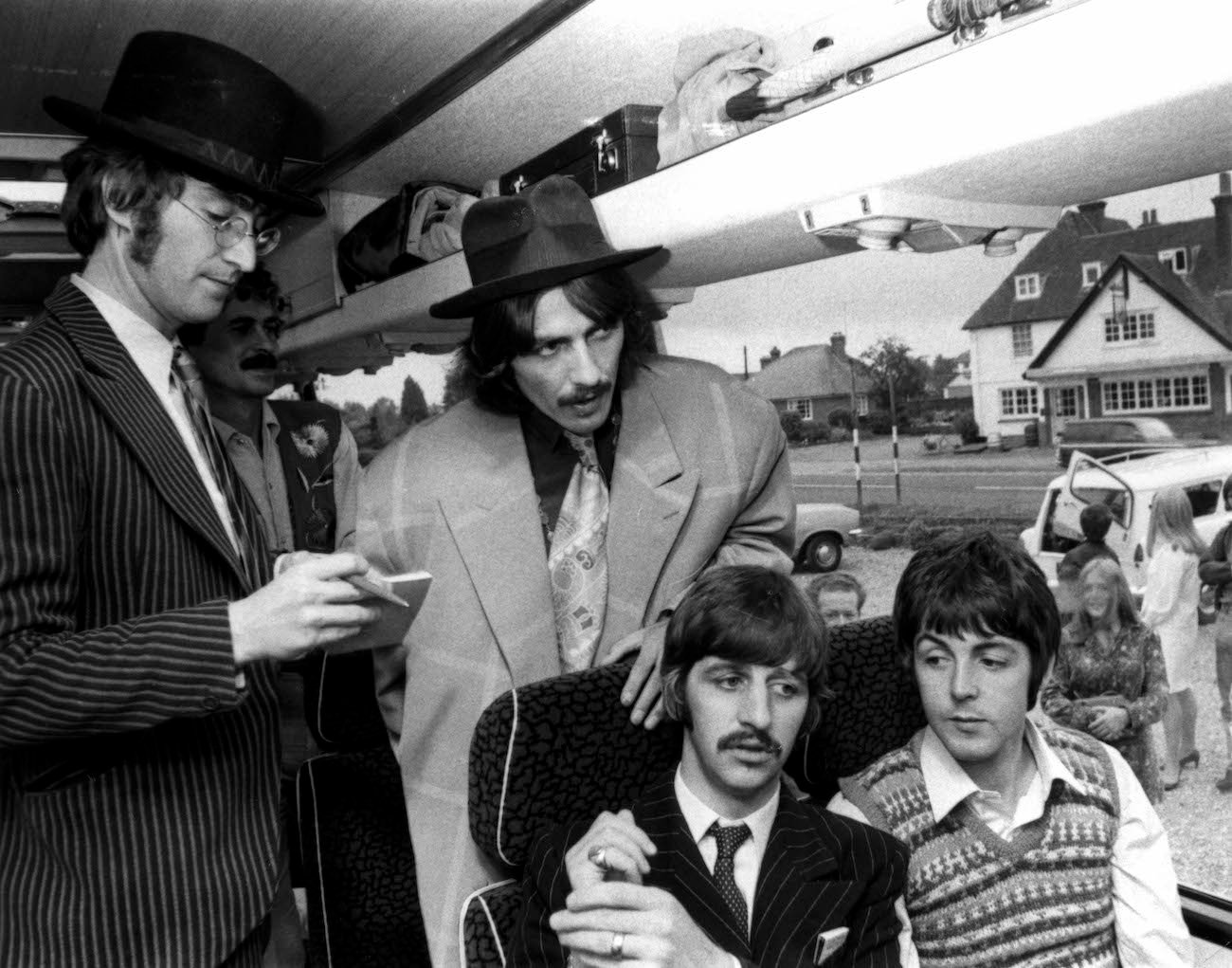 The Beatles on a bus during the filming of 'Magical Mystery Tour' in 1967.